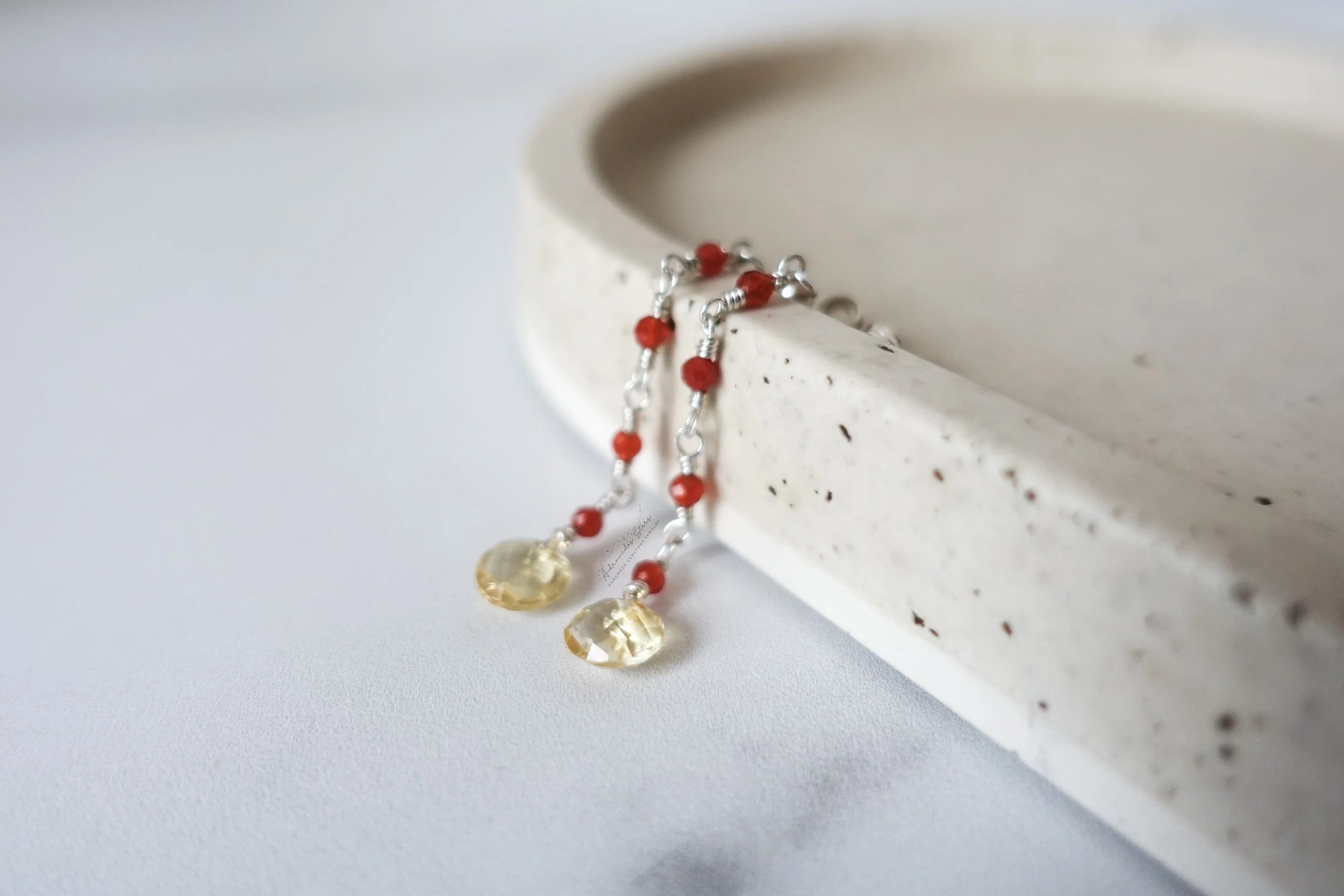 citrine carnelian earrings ss tray hanging.jpg