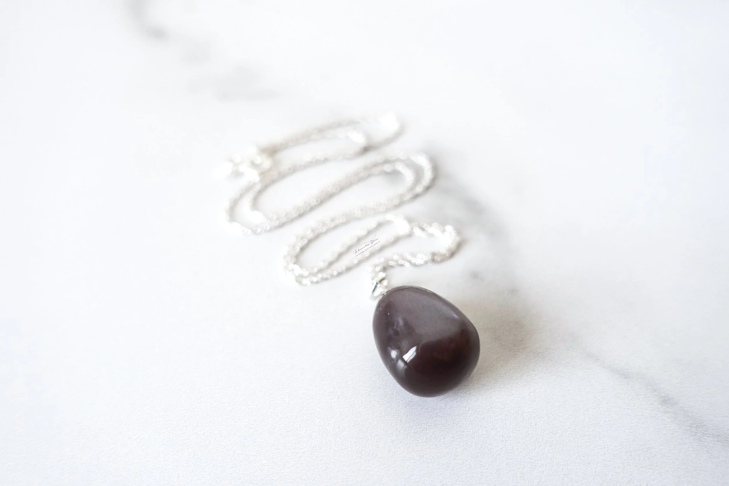 chocolate moonstone pendant ss necklace close up squiggle.jpg