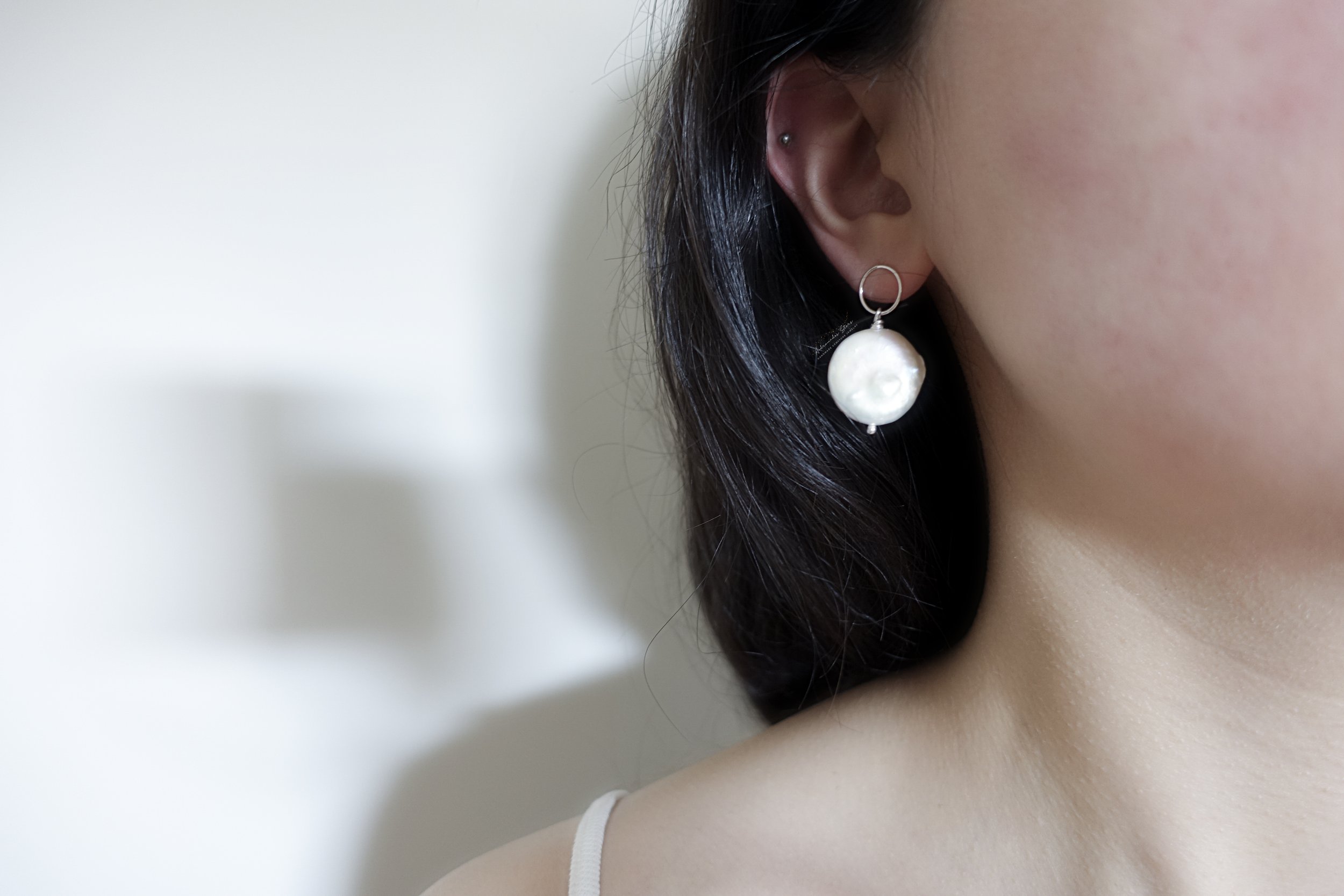 coin pearl earrings model.jpg