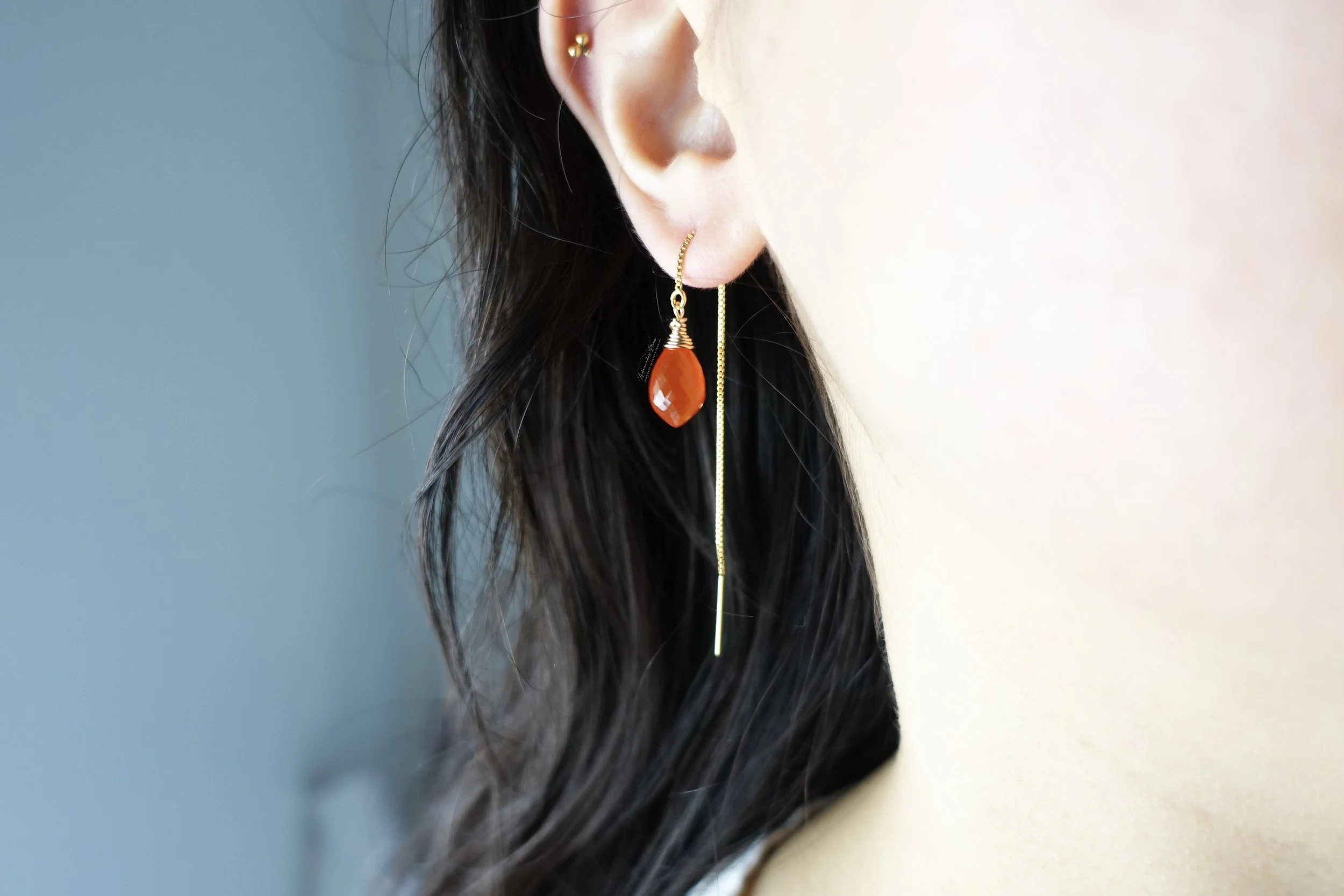 orange carnelian threaders on model.jpg