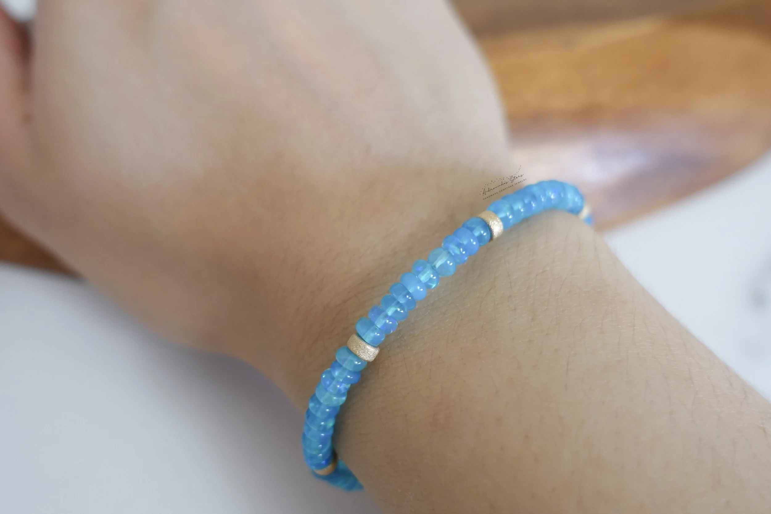 blue ethiopian opal bracelet model.jpg