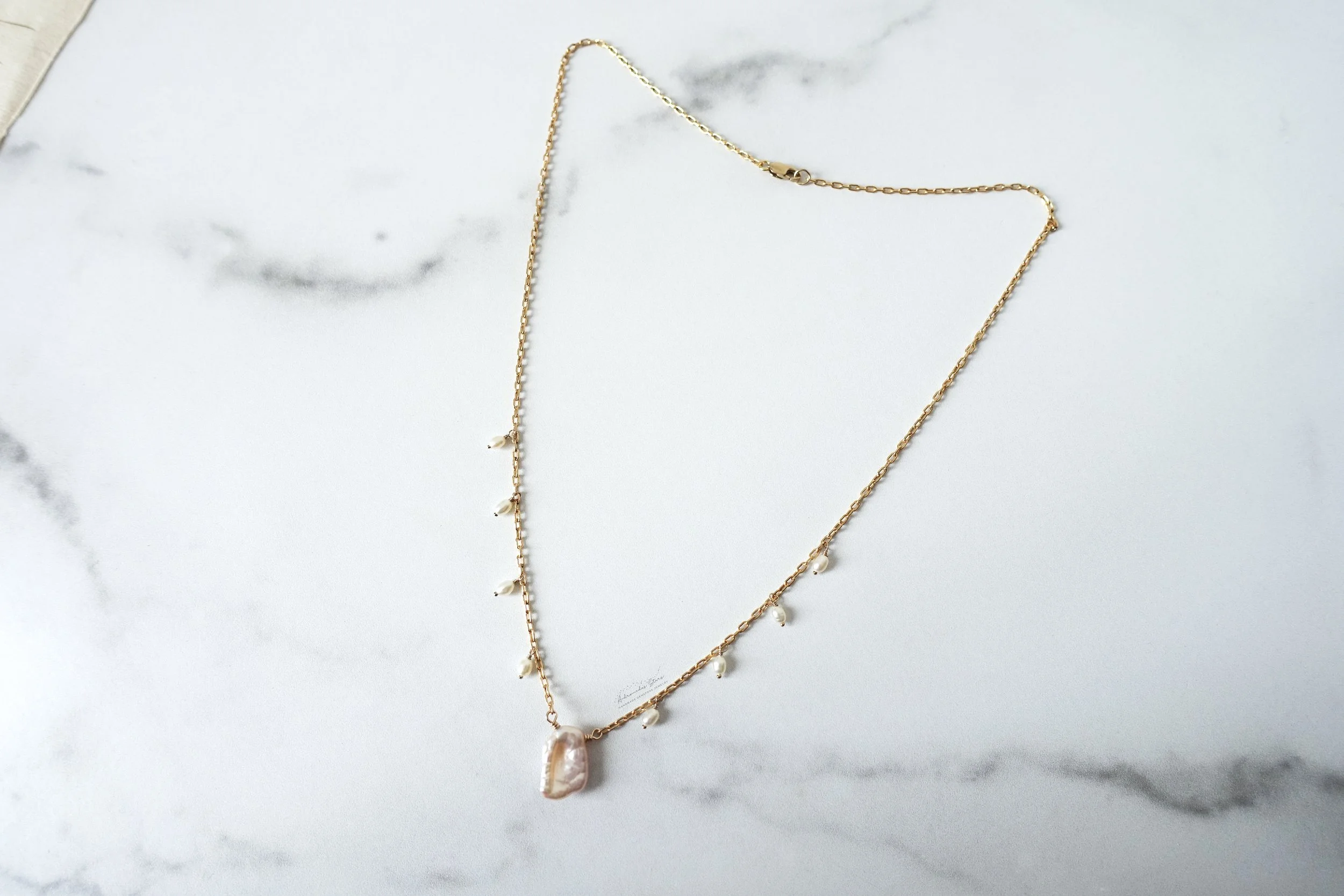 pearl dangle necklace gf birds eye.jpg