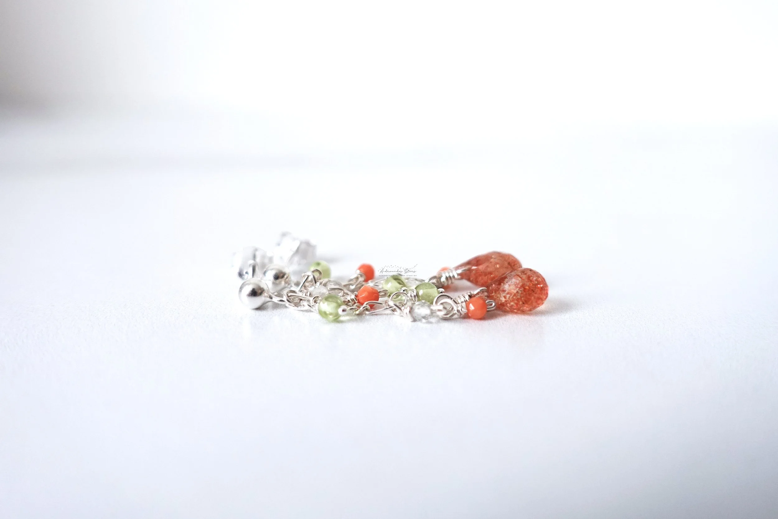 sunstone dangle earrings full view.jpg