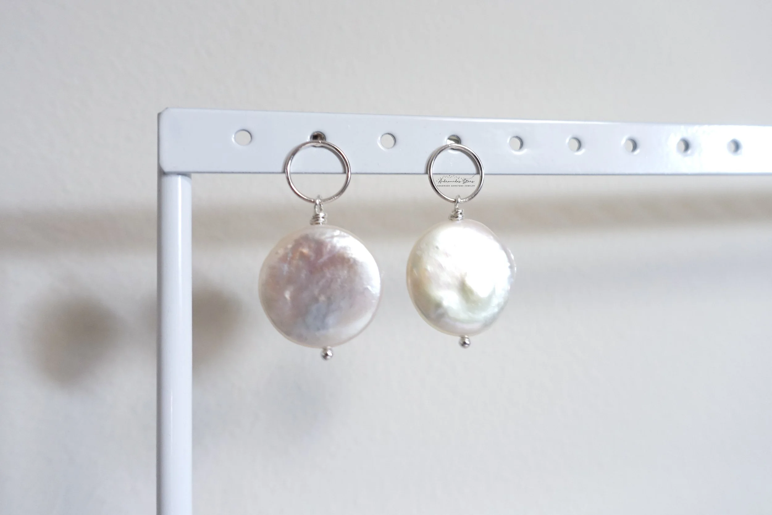 coin pearl ss earrings hanging.jpg