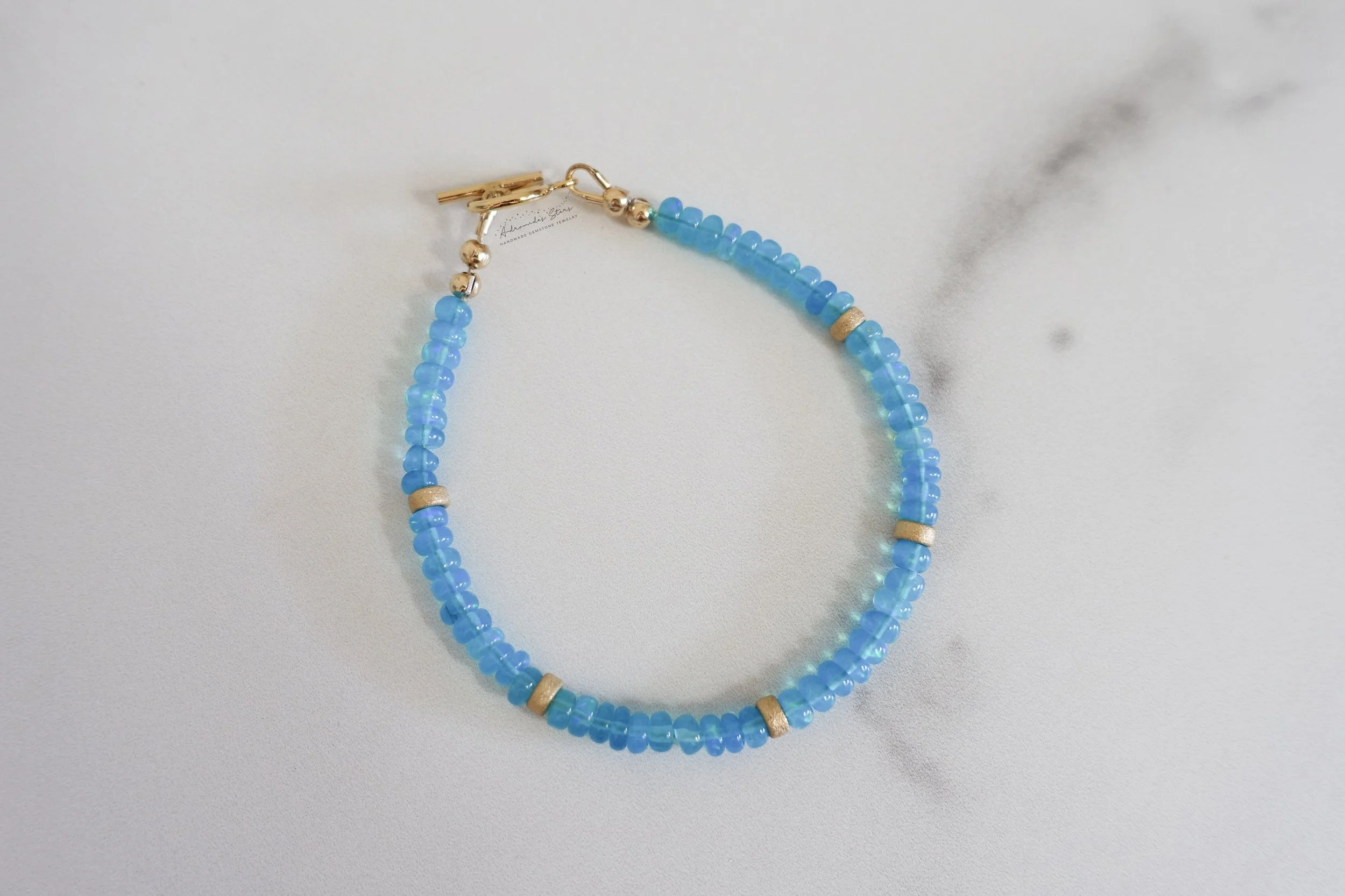 blue ethiopian opal bracelet birds eye view.jpg