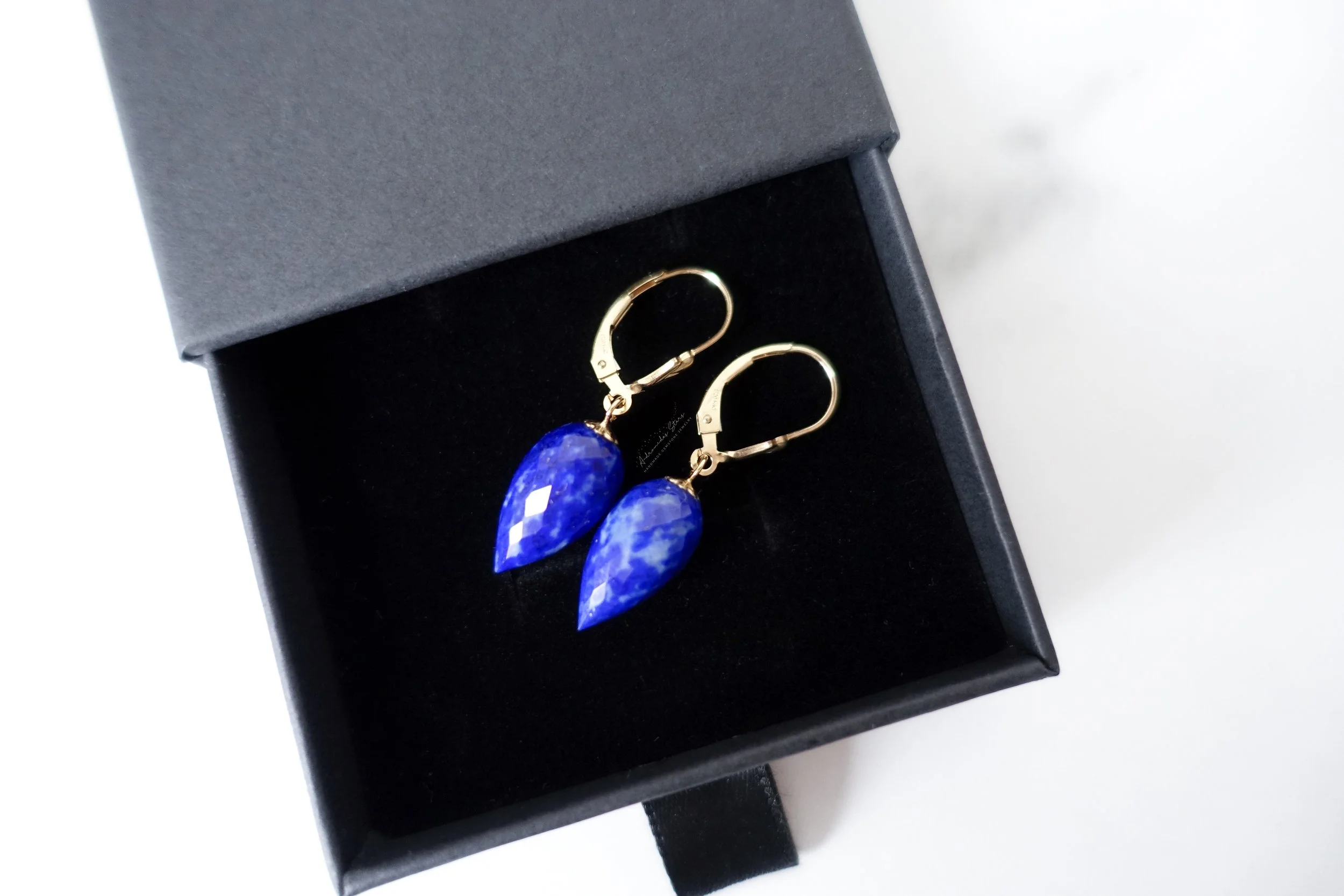 lapis earrings lever back black box.jpg