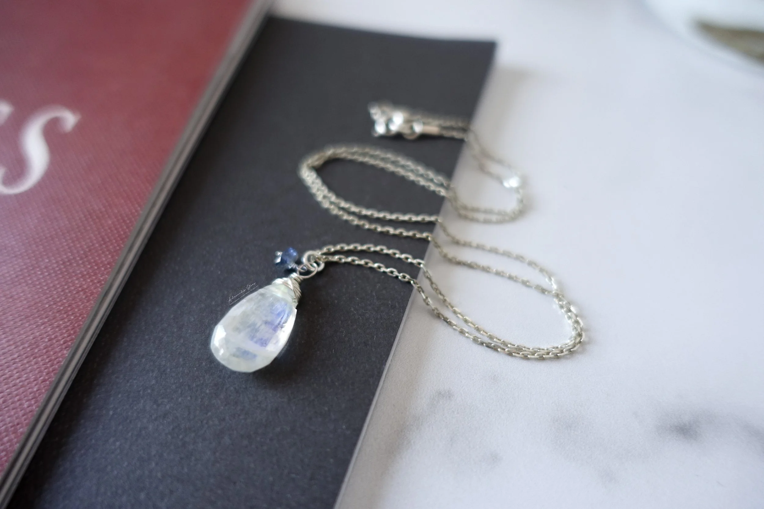 moonstone kyanite ss necklace booklets.jpg