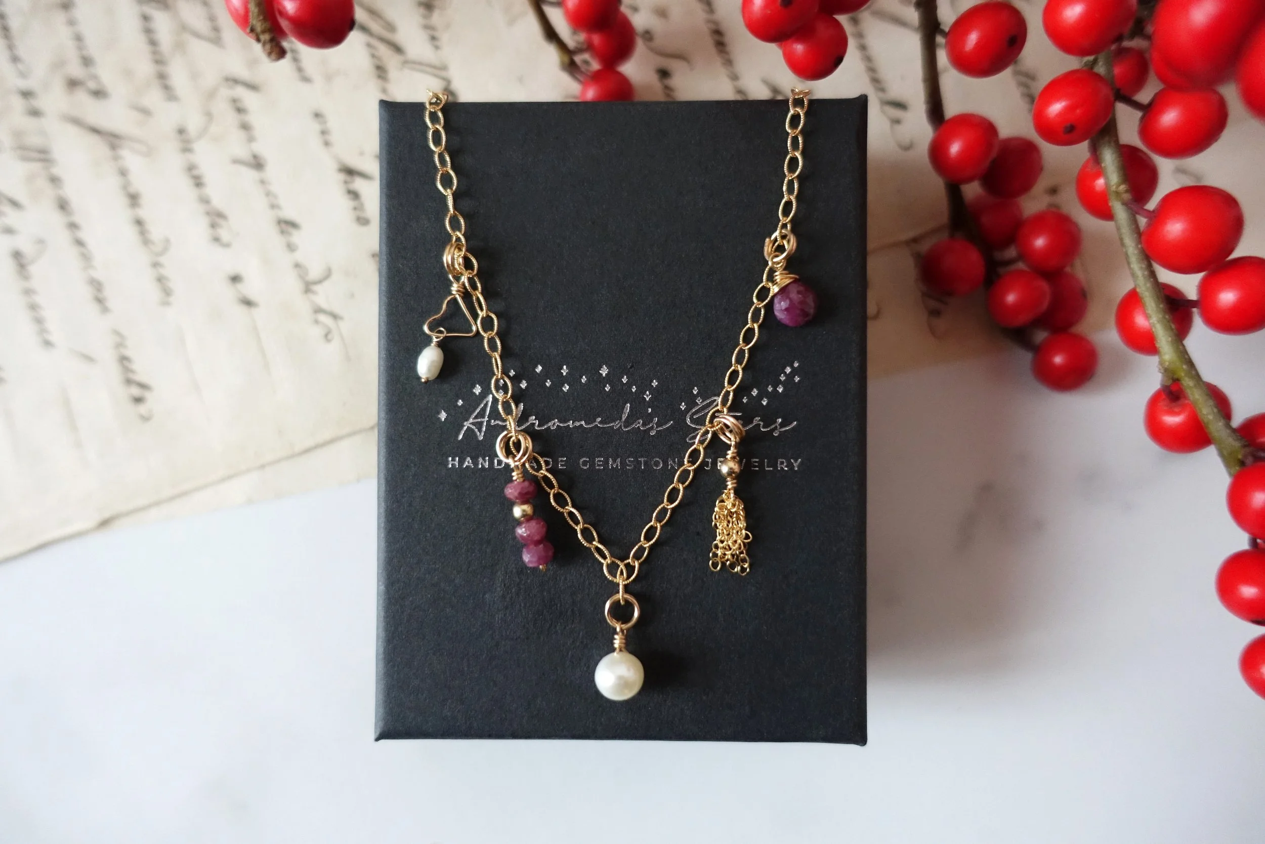 gold charm necklace birds eye box holiday.jpg