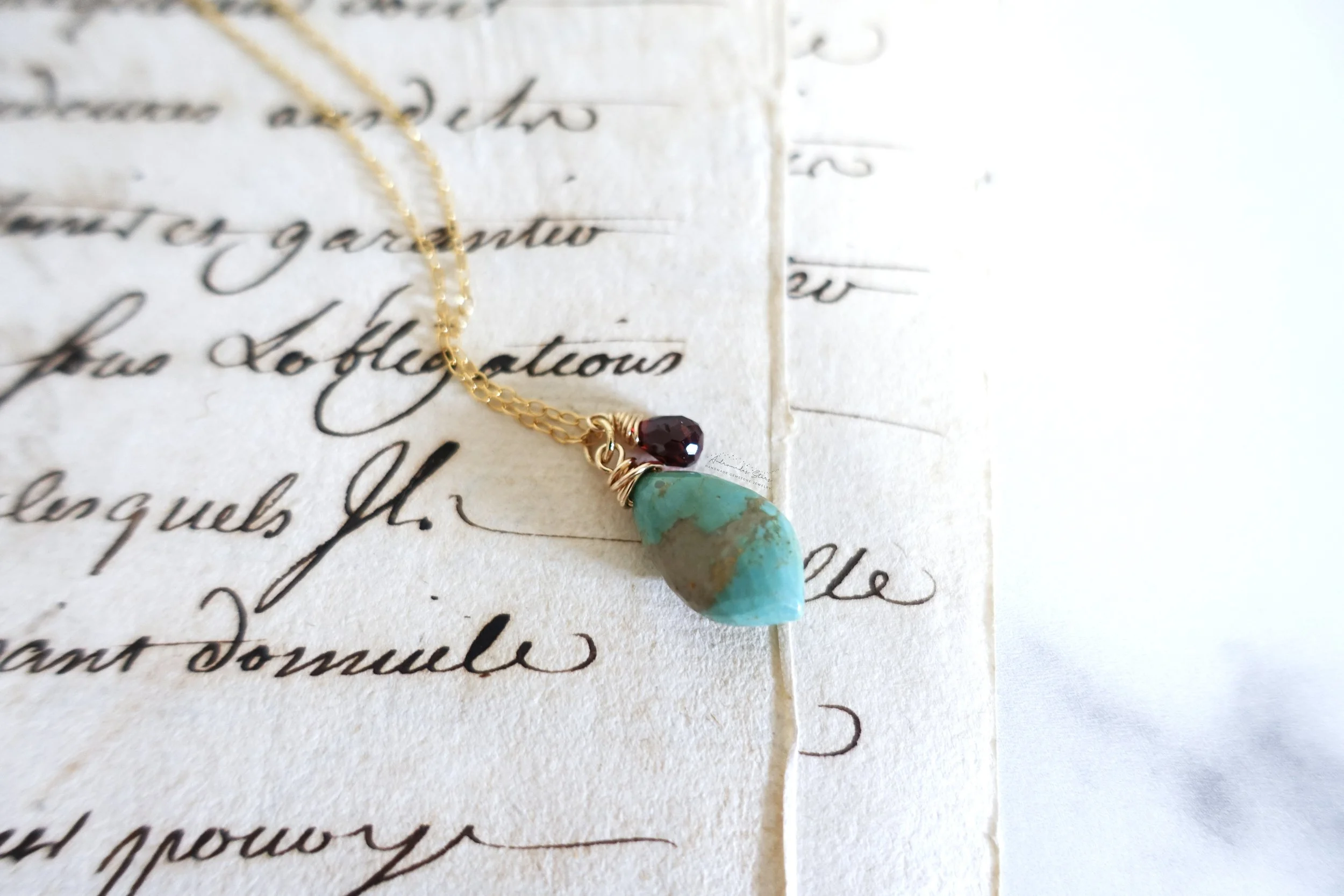 kingman turquoise garnet necklace close up script.jpg