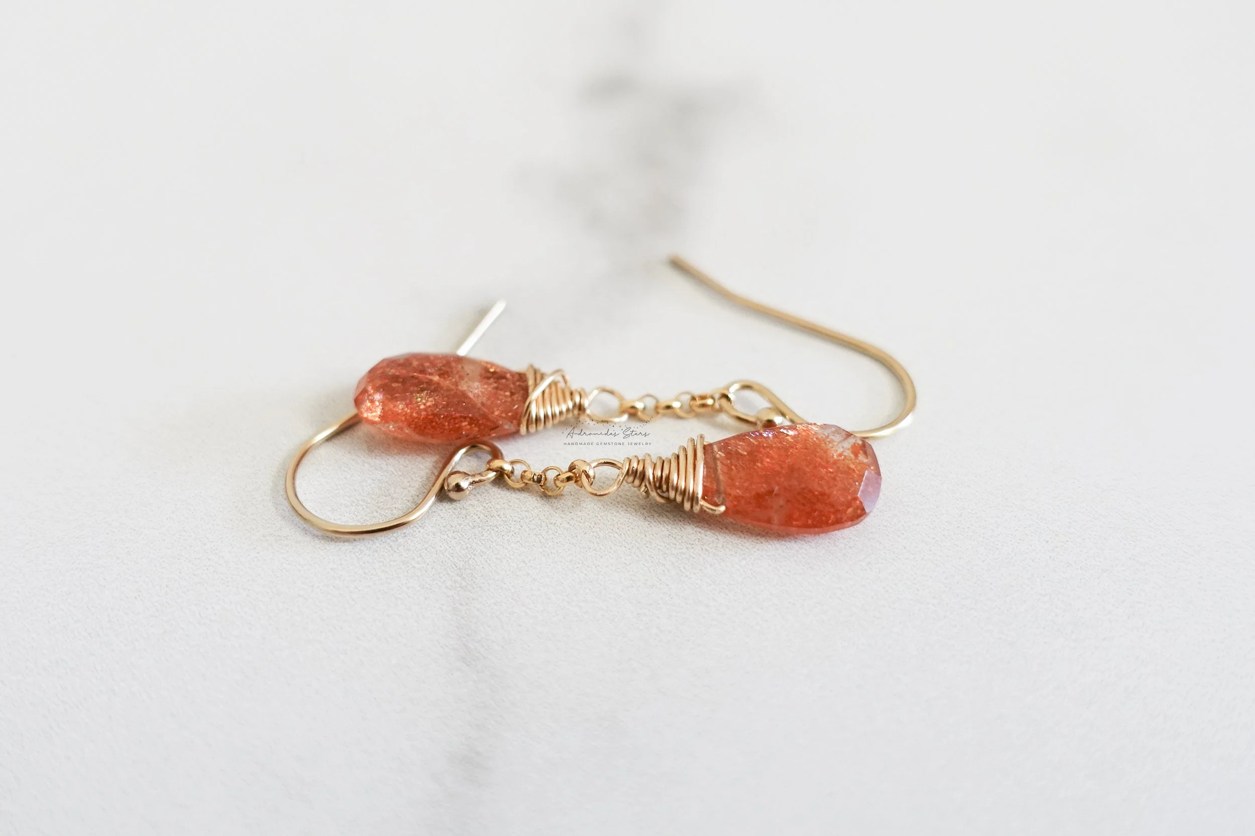 sunstone dangle earrings gf opposite directions.jpg