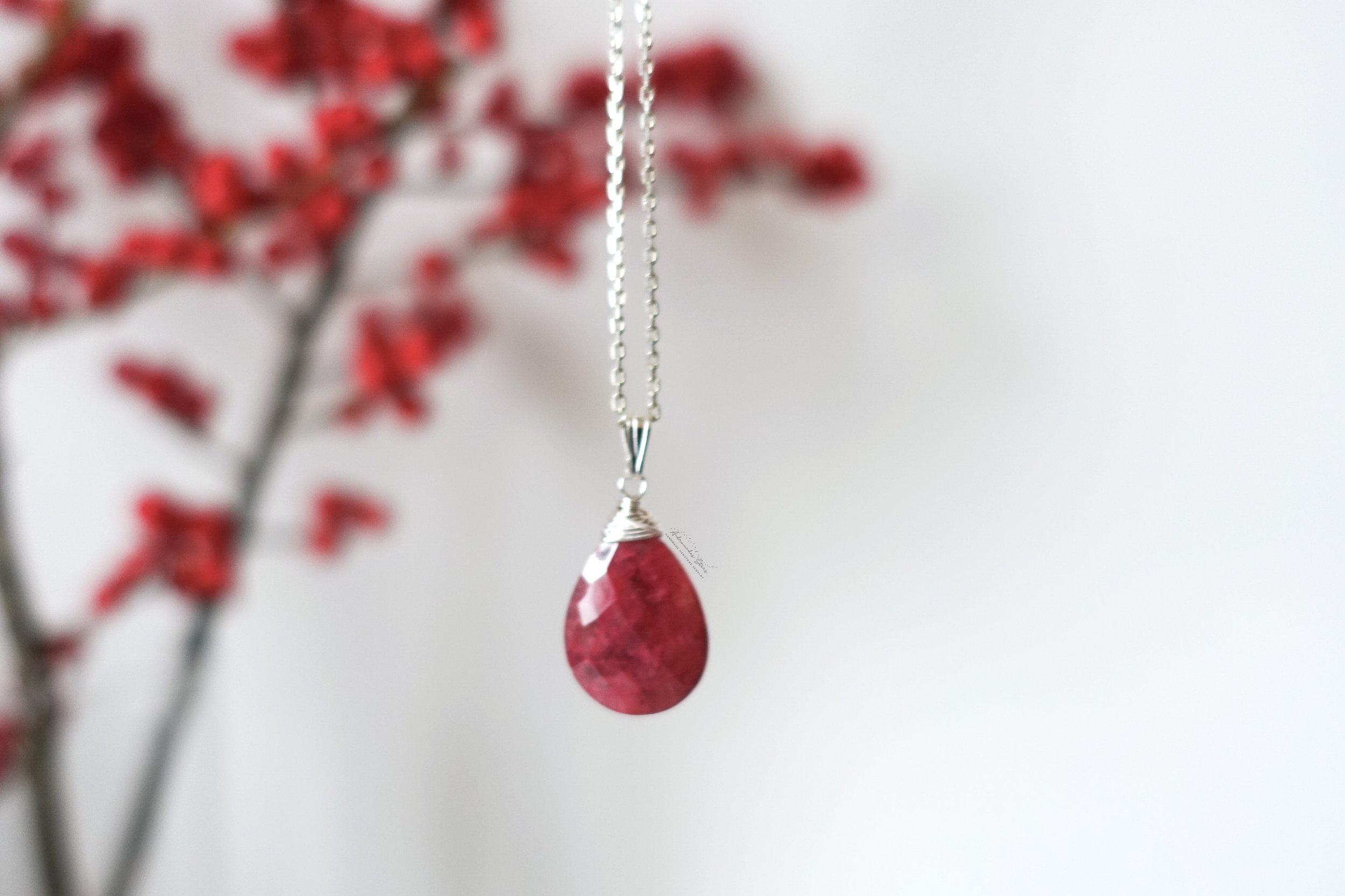 ruby necklace ss hanging red background.jpg