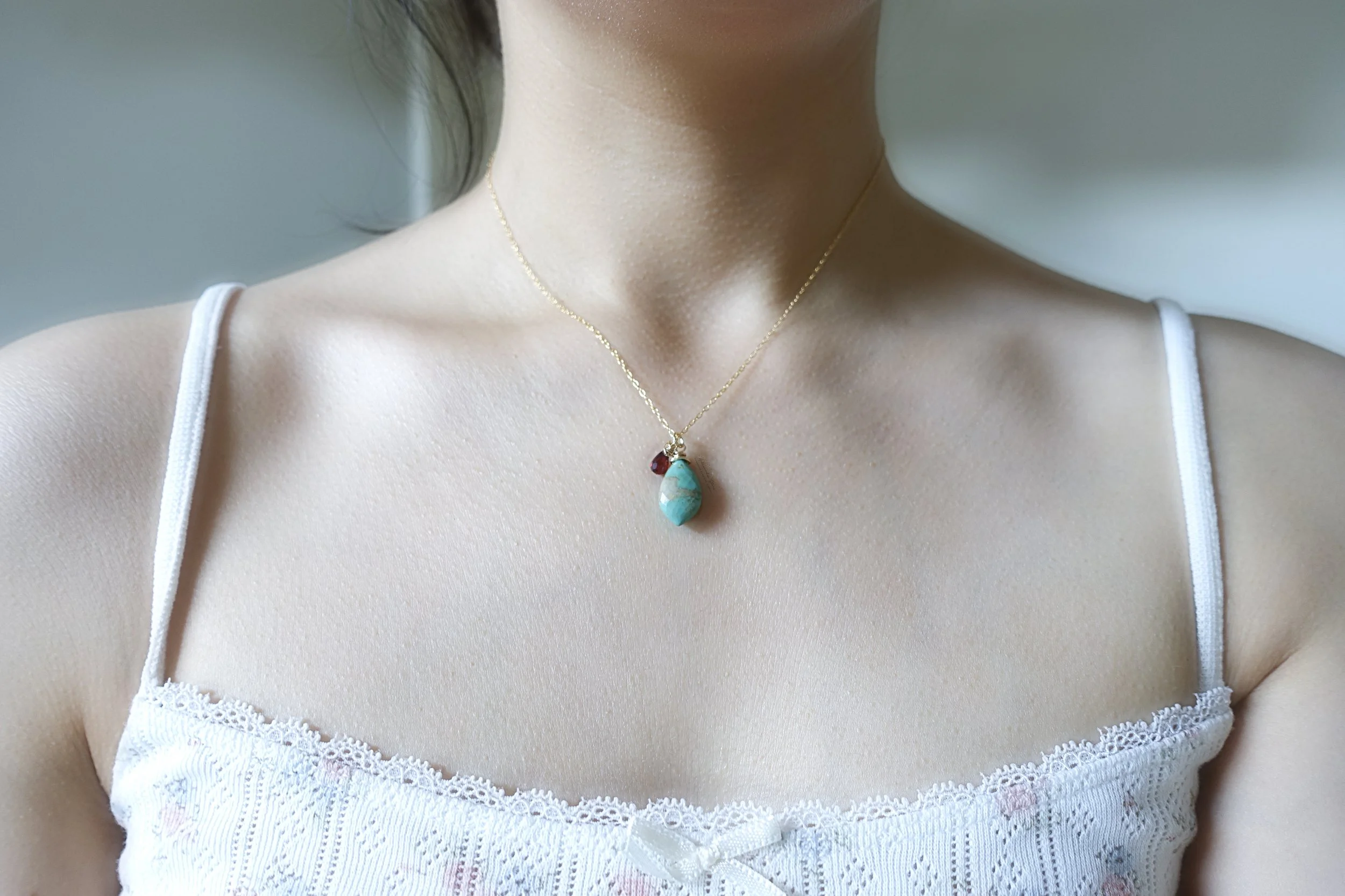 turquoise garnet necklace model.jpg