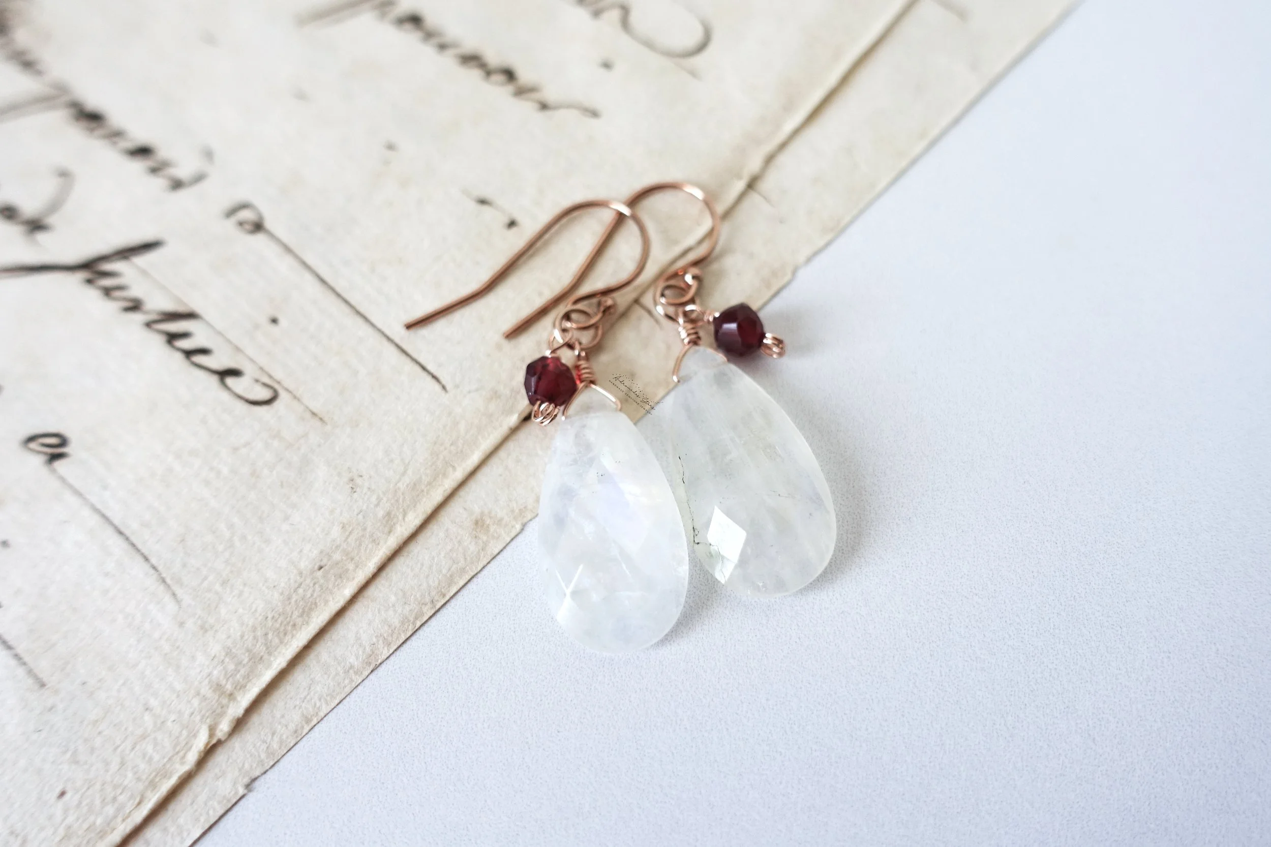 moonstone garnet rose gold earrings script.jpg