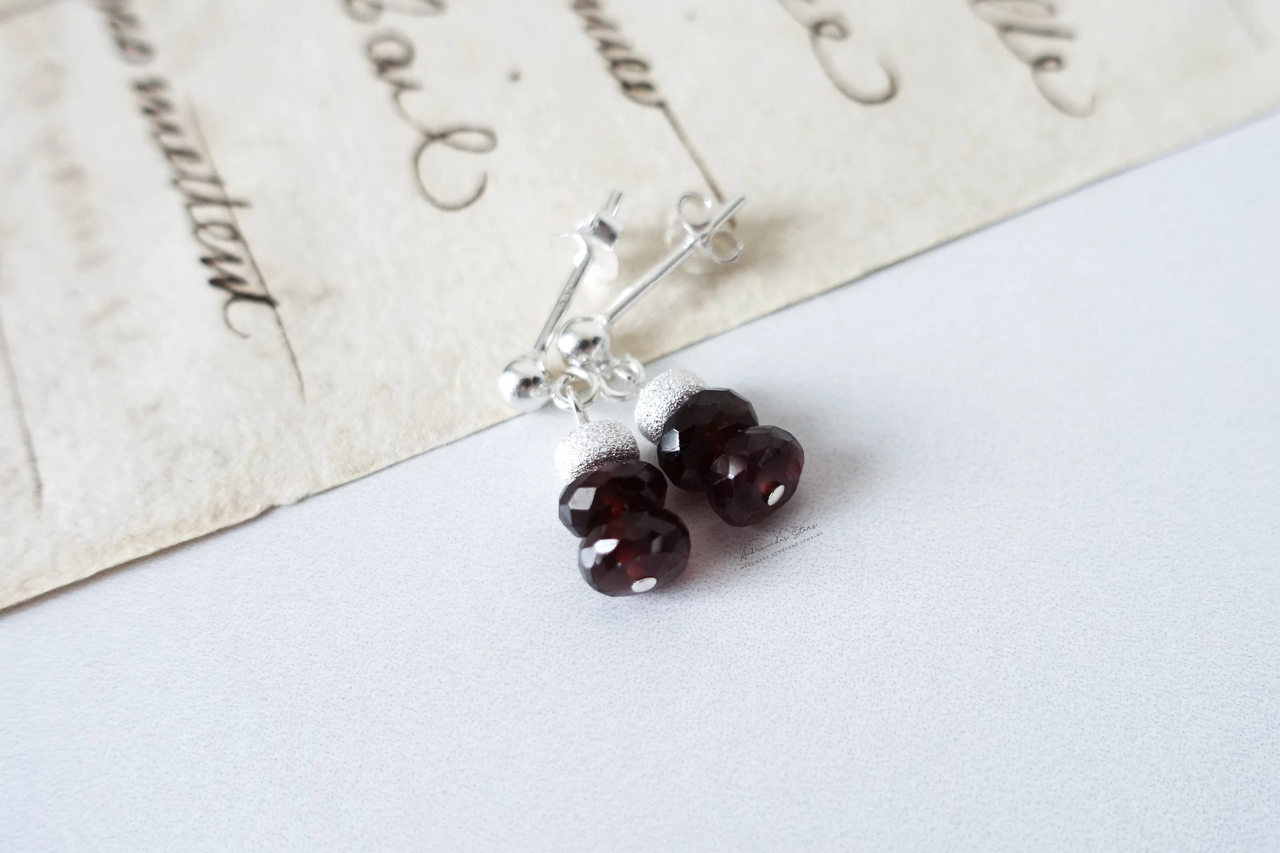 garnet drop earrings ss script.jpg