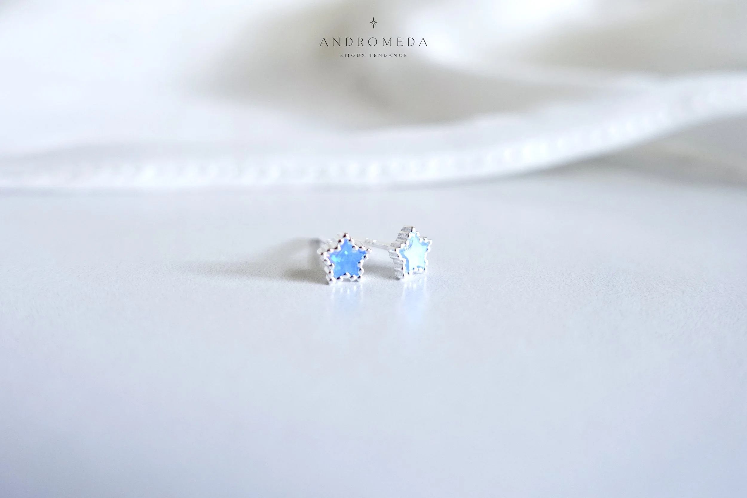 manmade blue opal star earrings 2 AB.jpg