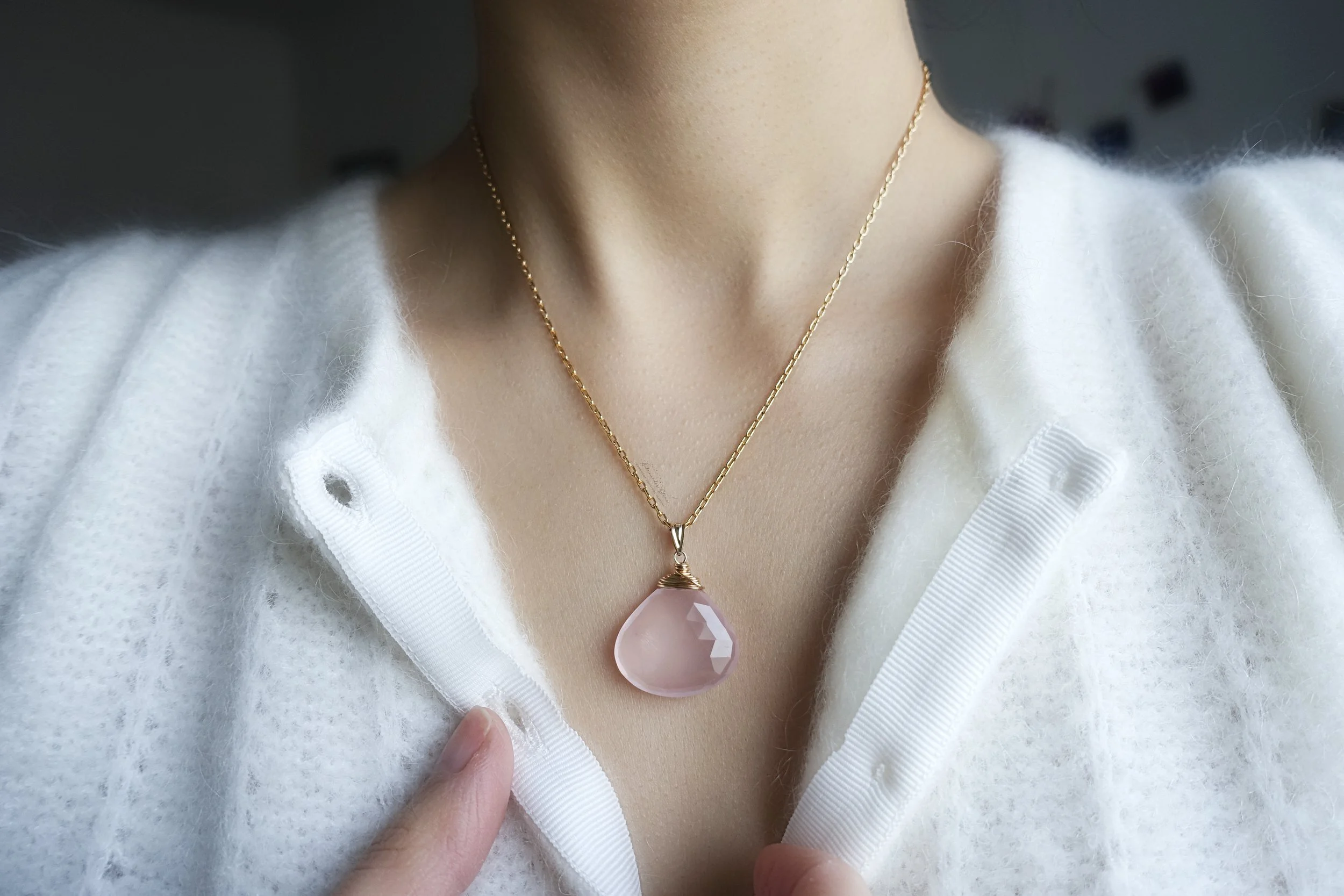 rose quartz necklace on model.jpg