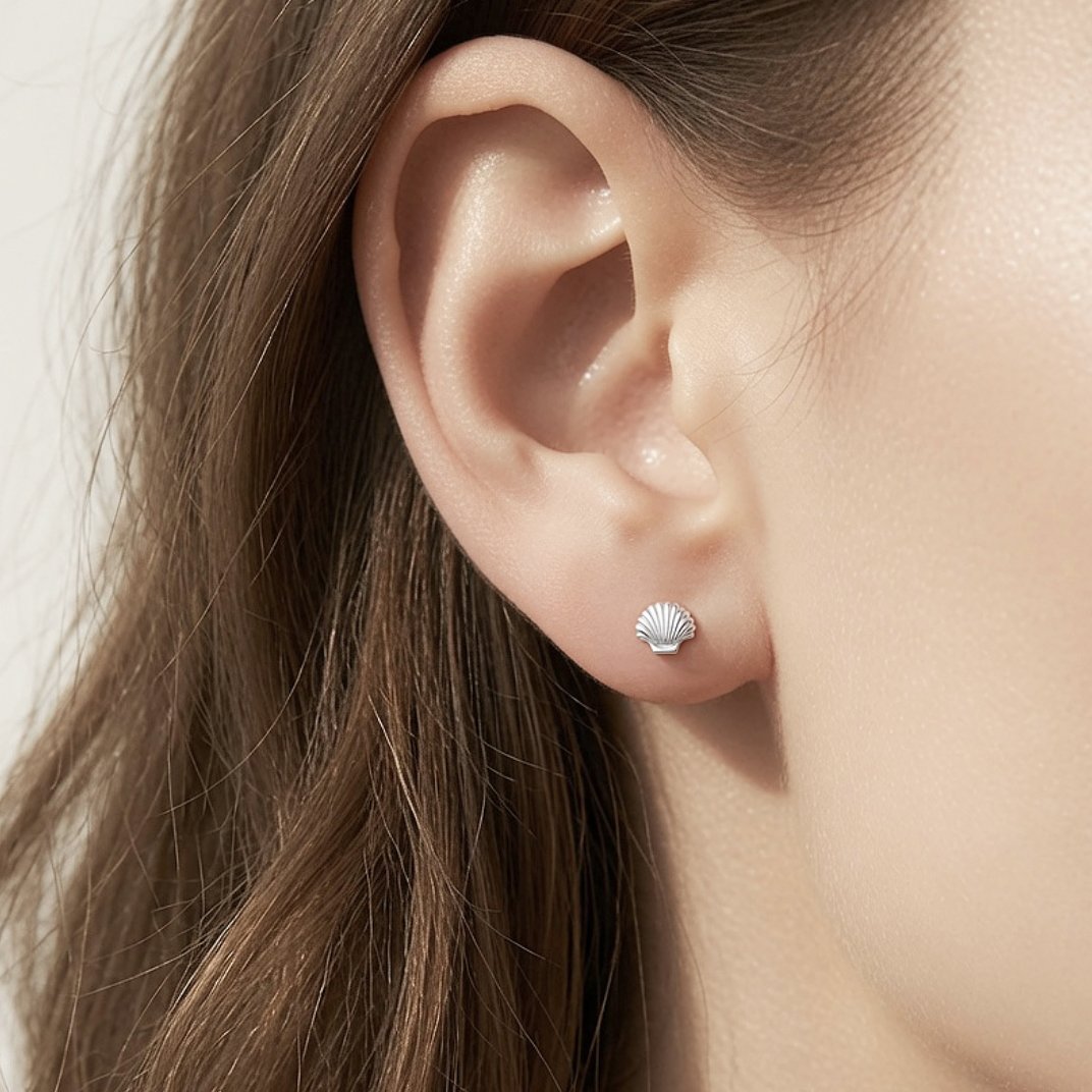 sea shell earrings ss modeled.jpg