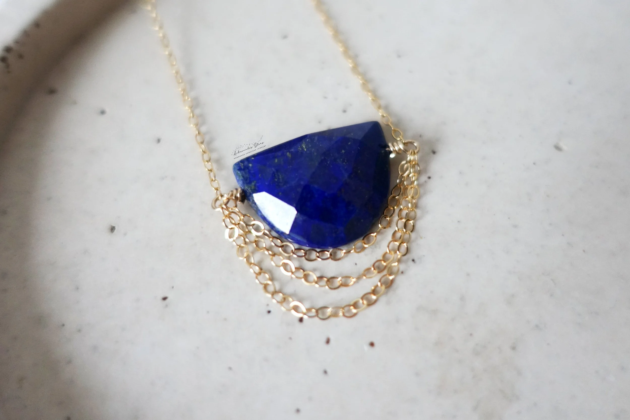 lapis lazuli necklace close up tray.jpg