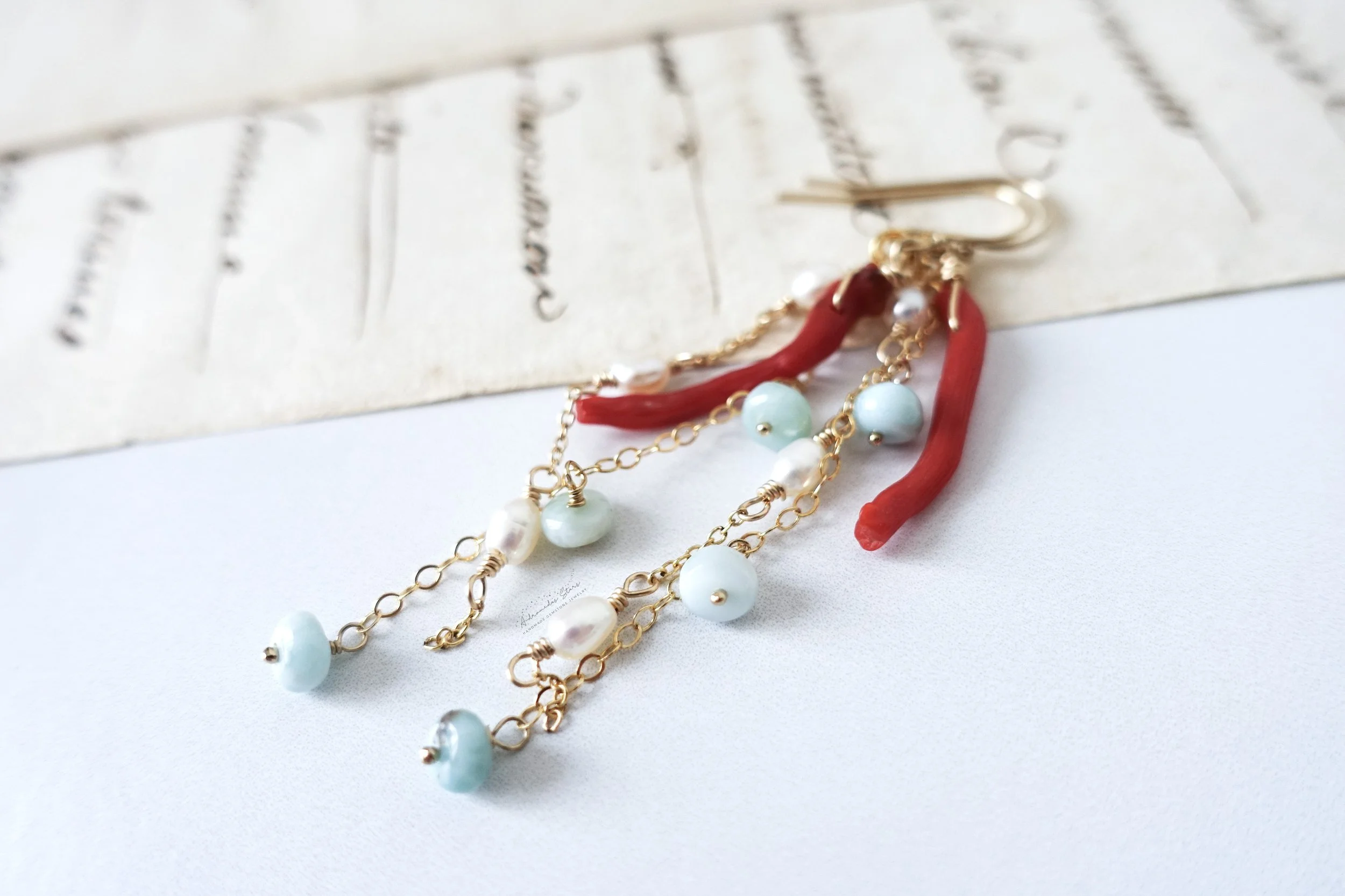 ocean treasure earrings coral script.jpg