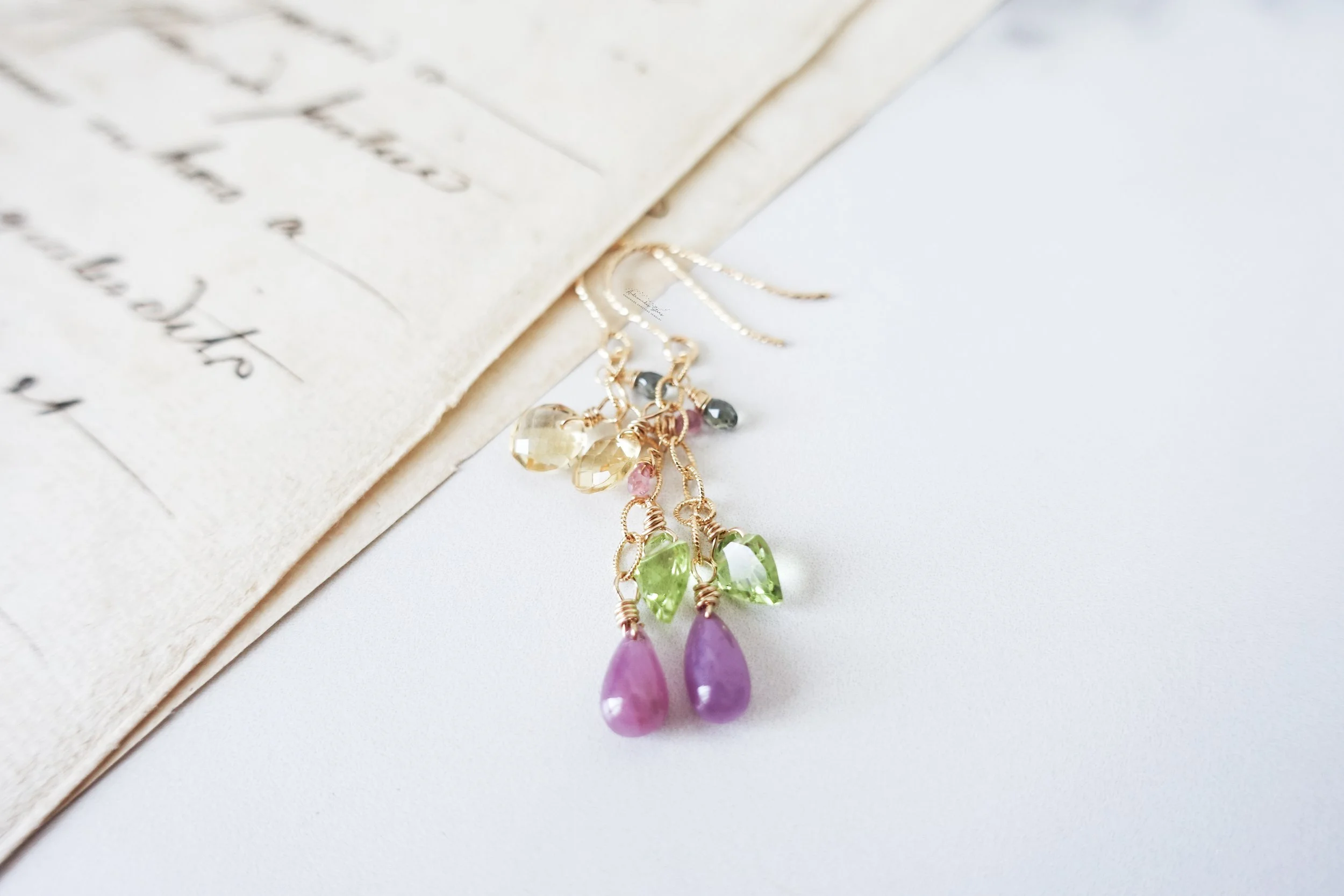 multi gemstone citrine peridot sapphire earrings script.jpg