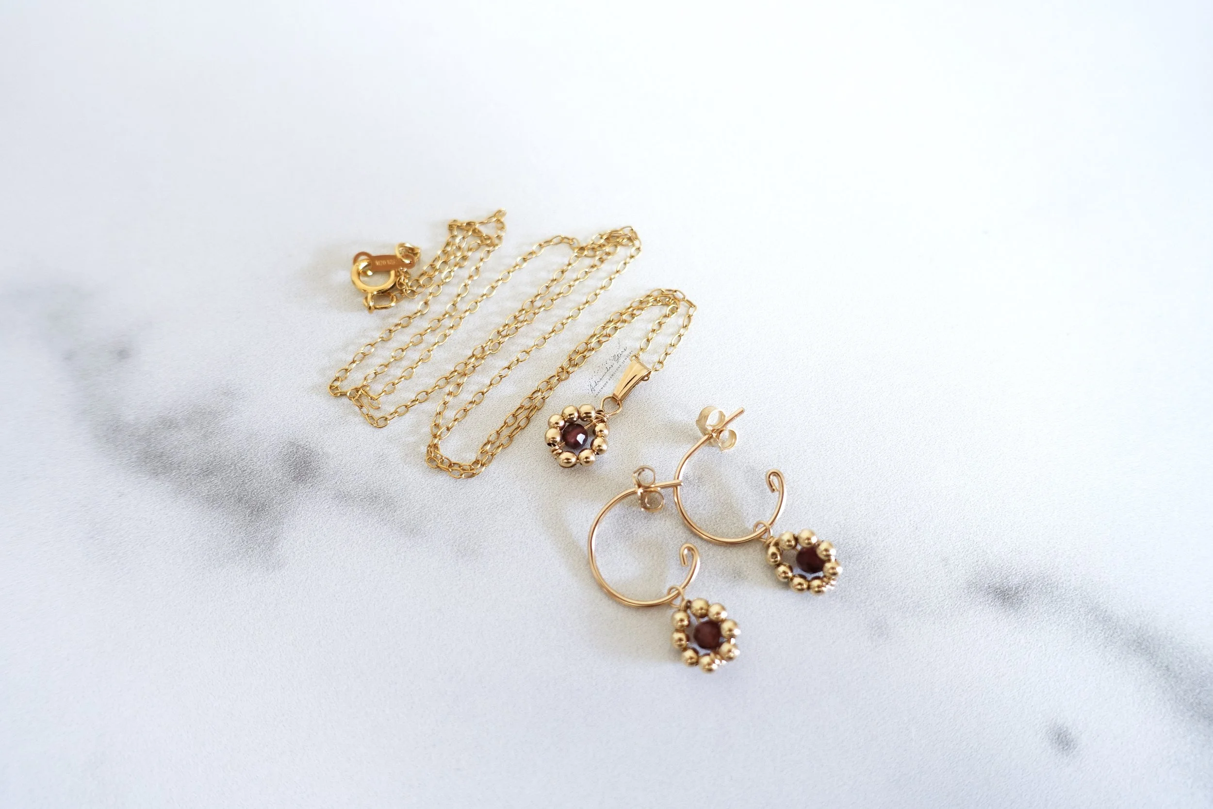 wire wrapped flower necklace and earrings together.jpg
