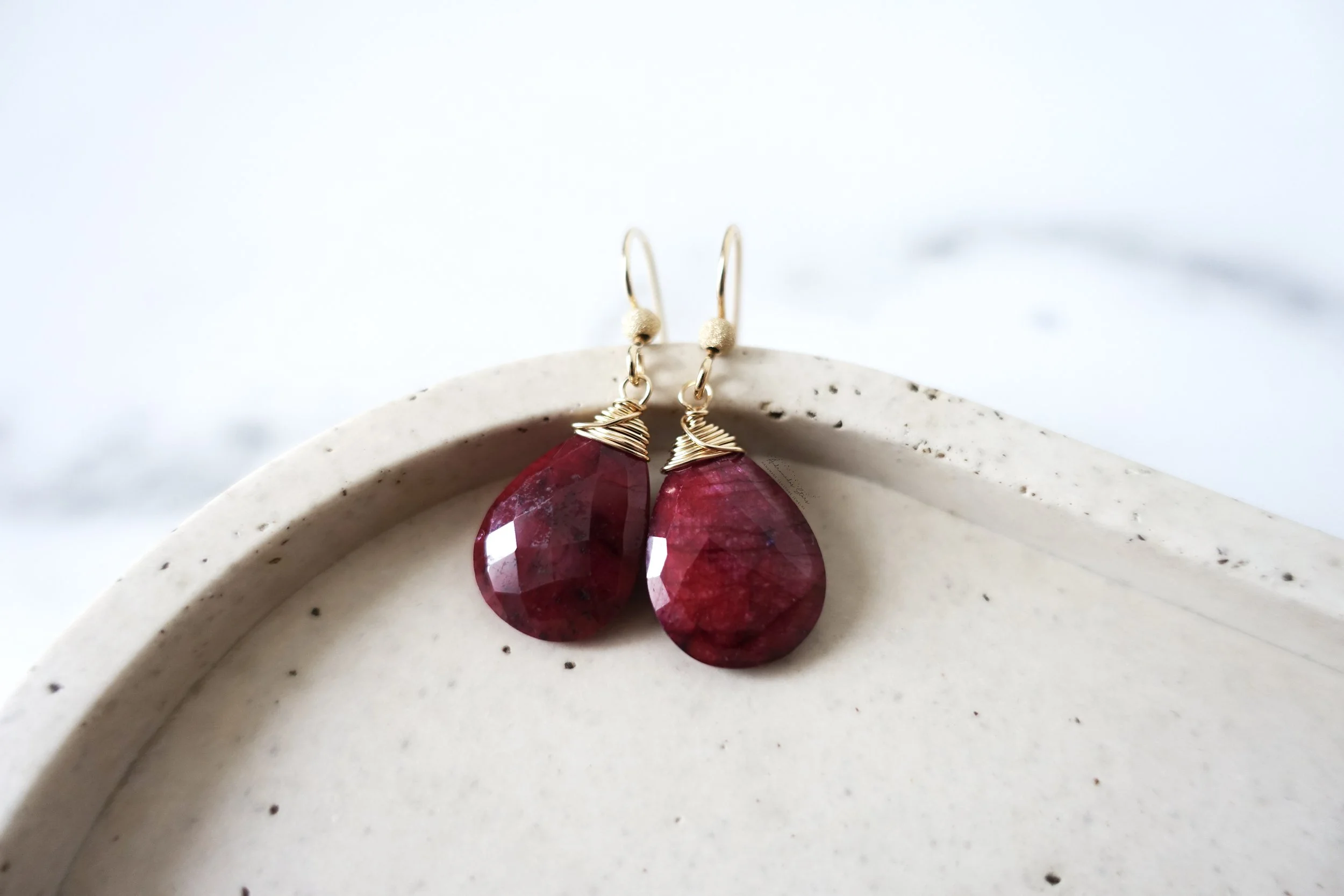 ruby earrings in tray gf.jpg