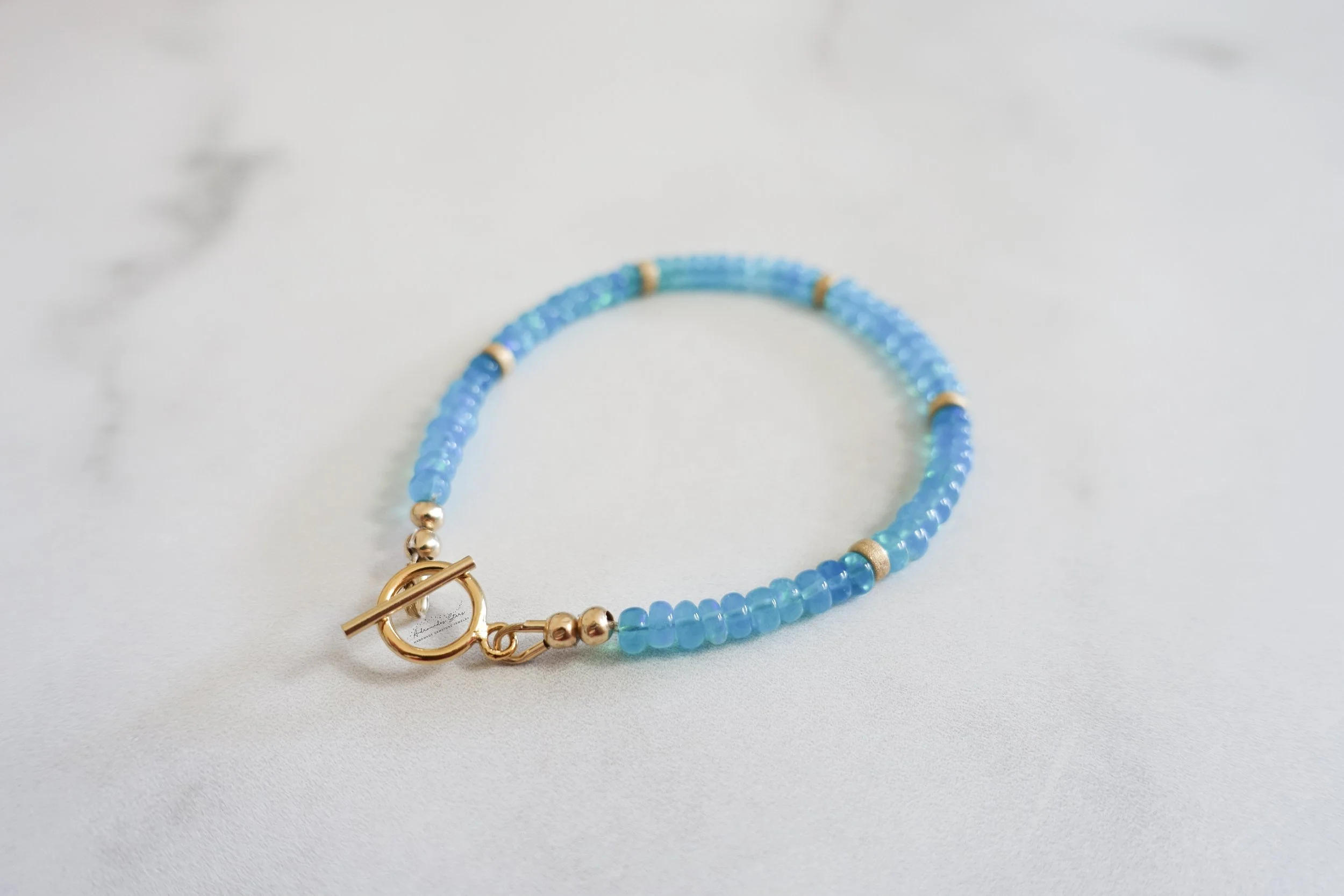 blue ethiopian opal bracelet toggle close up.jpg