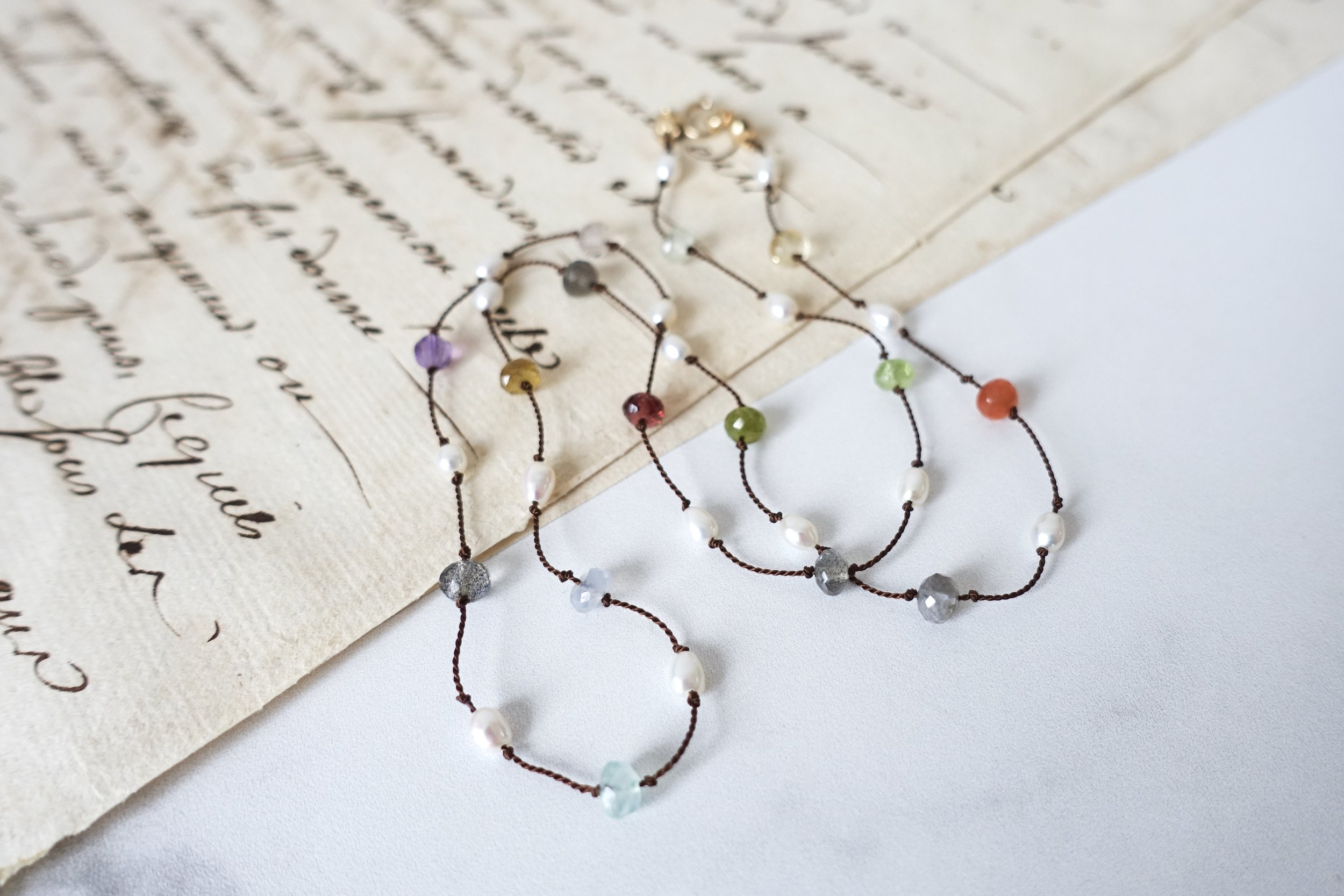 multi gemstone pearl silk necklace script.jpg