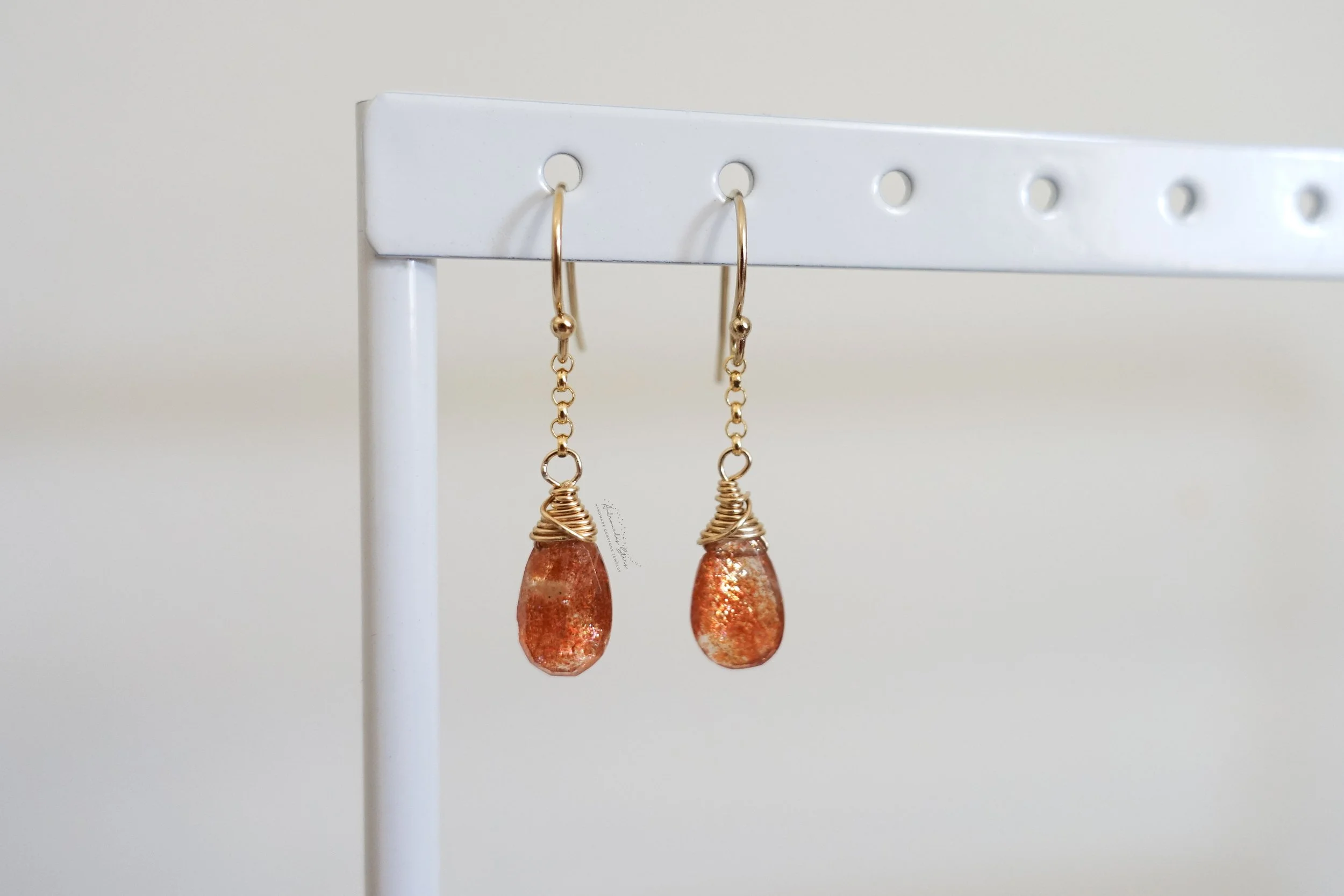sunstone dangle earrings gf hanging.jpg