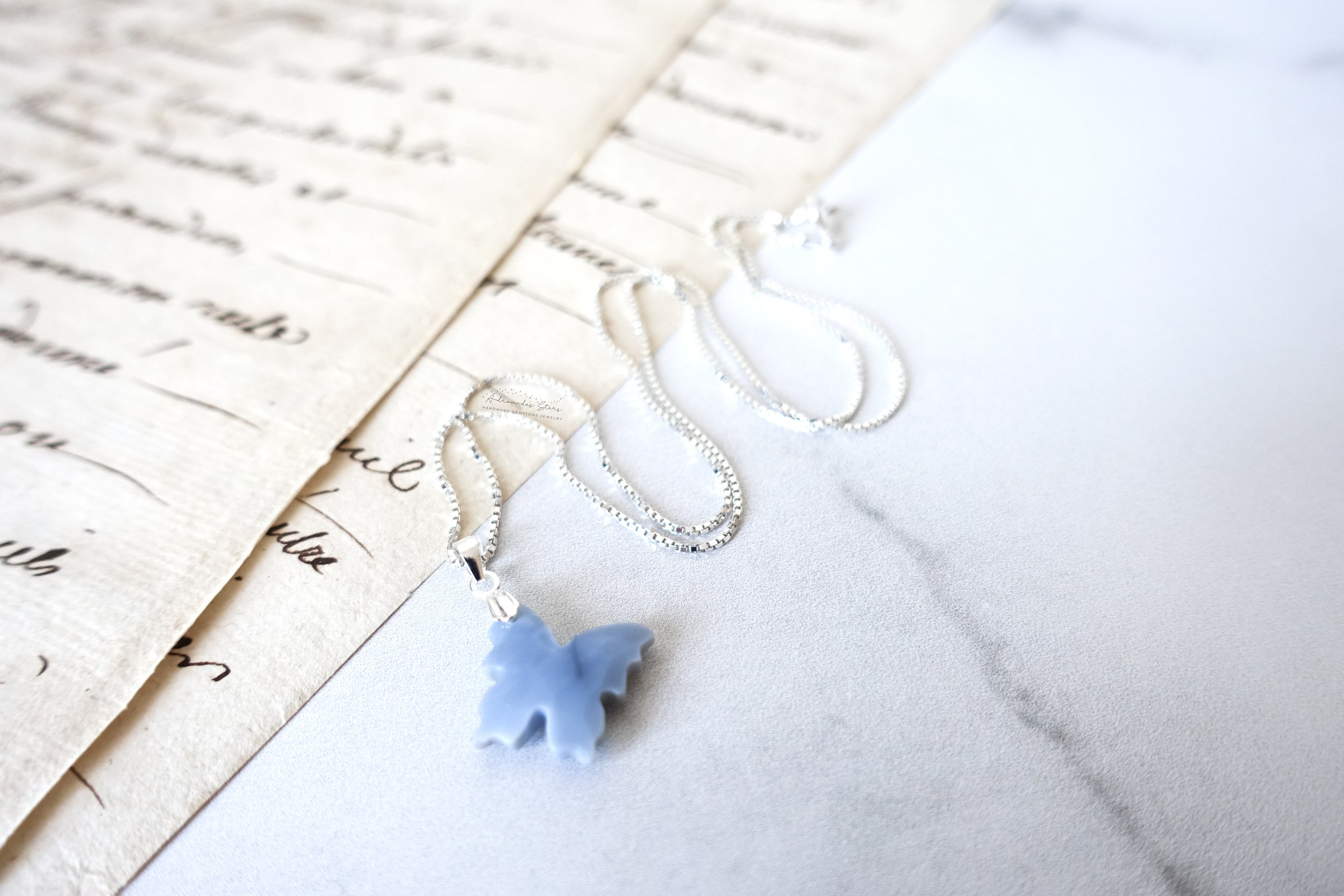 blue opal butterfly script.jpg