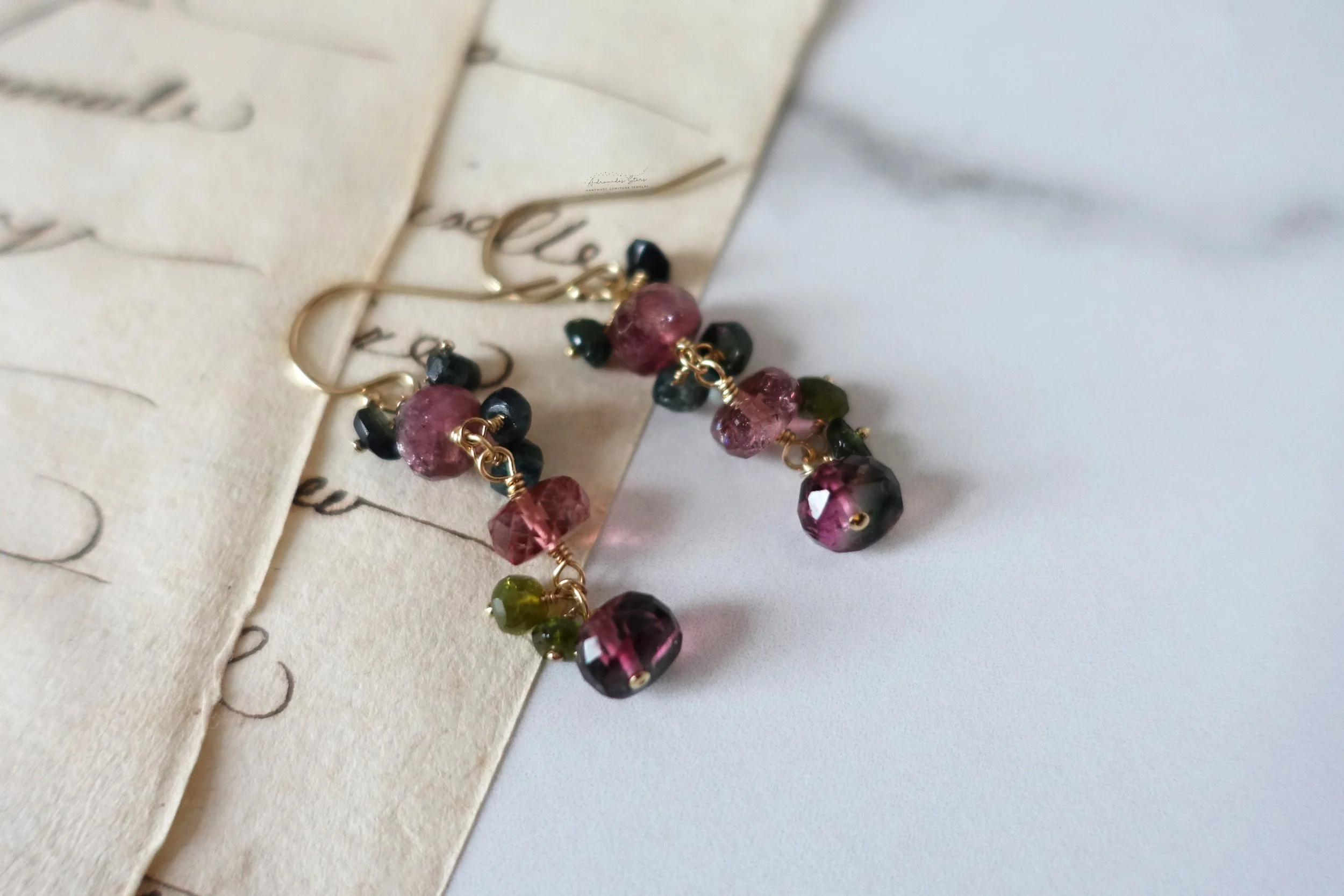 watermelon tourmaline earrings script close up.jpg