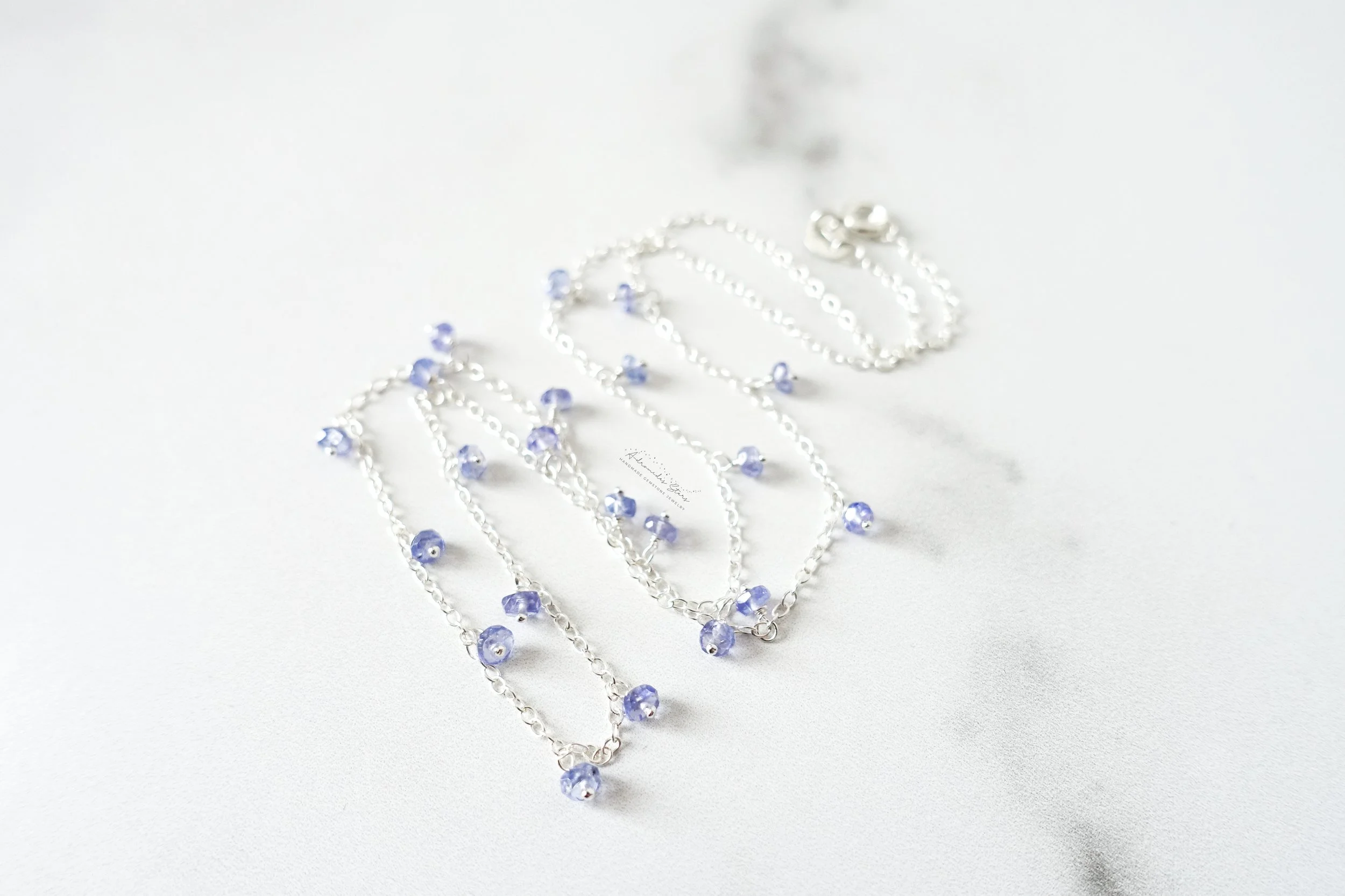tanzanite necklace ss side .jpg