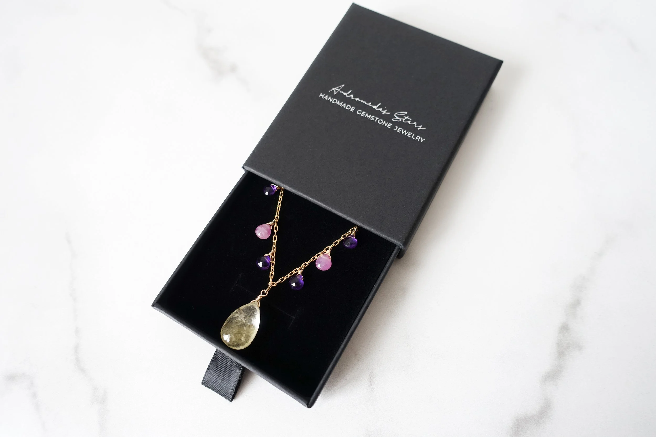 rutilated quartz multi stone necklace box.jpg