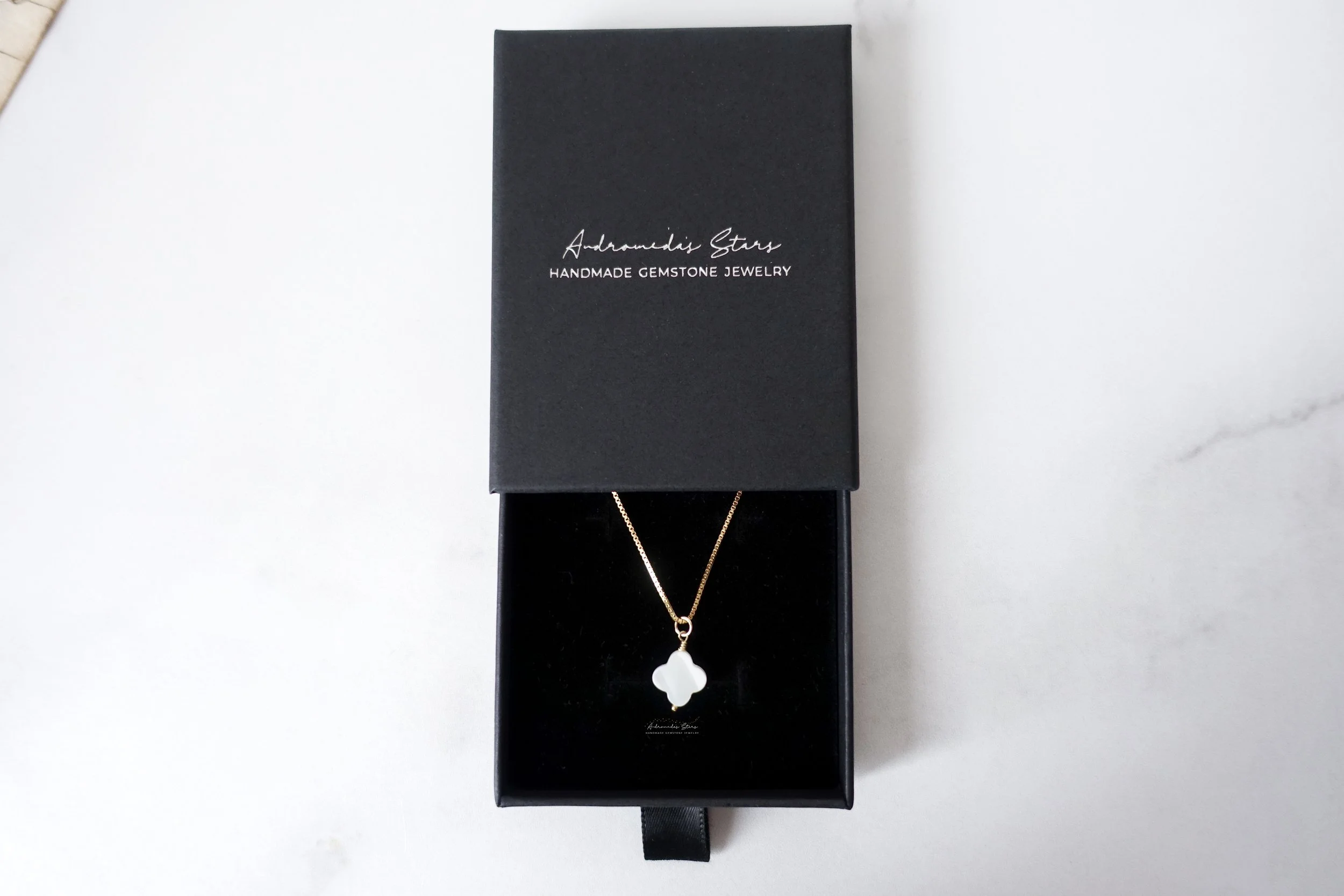 clover mop necklace black box.jpg