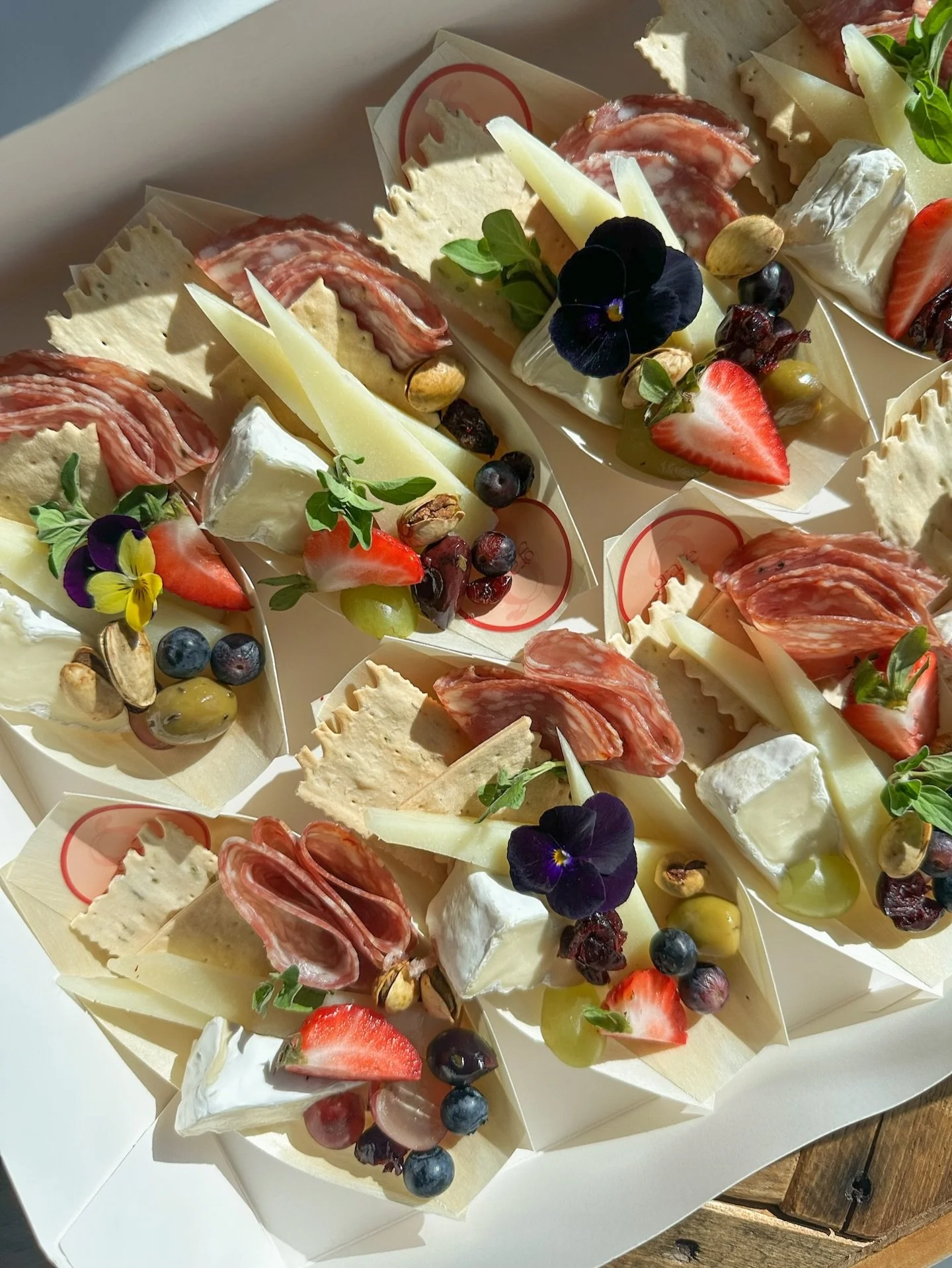 We&rsquo;re almost to spring which means more fresh flowers 🌸 These pansy flowers are edible and have a sweet, sometimes minty taste and make the most beautiful garnishes for our boards ✨