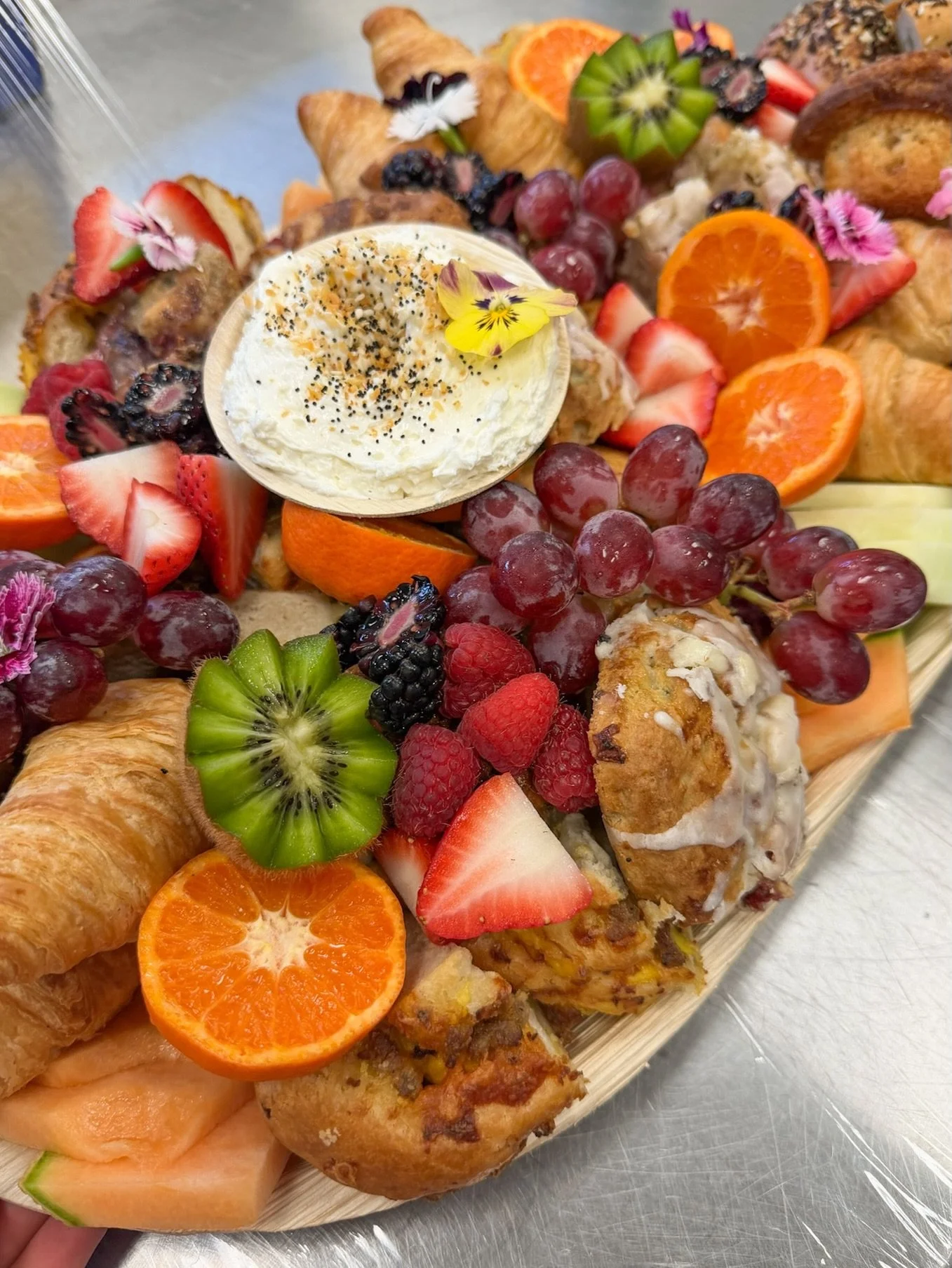 Brunch board so stacked it needs its own group chat 🥐🍓🥂