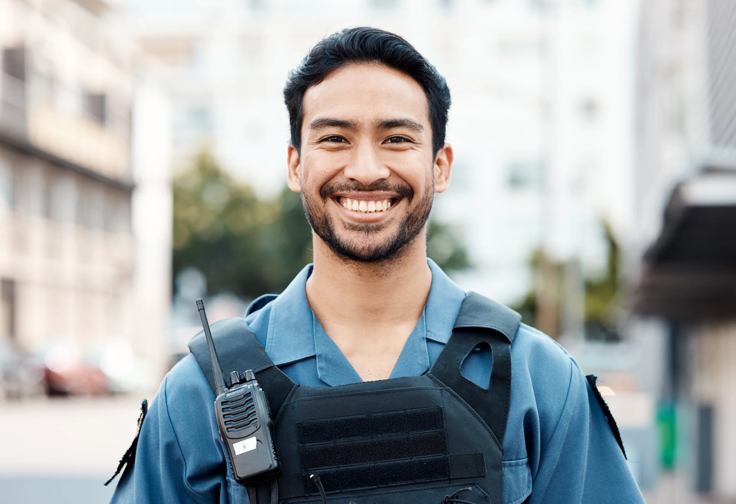 portrait-happy-or-policeman-in-city-for-law-enfor-2025-04-05-18-41-34-utc.jpg