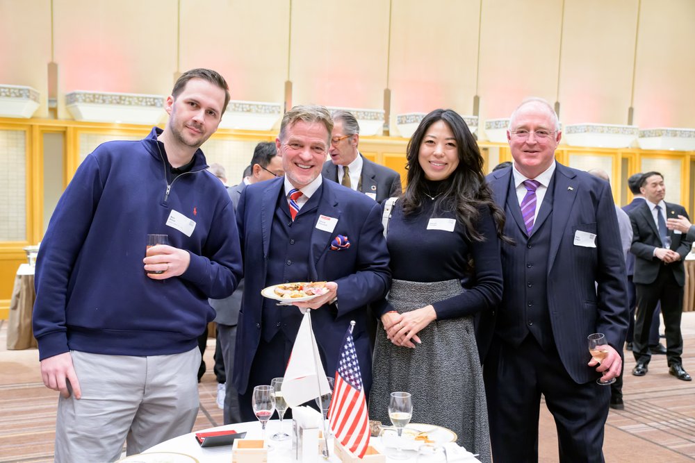  From Left: Ben Price, David Clement, Atsumi Tanaka, and Philip O’Neil celebrate the new year with drinks and foods at the Imperial Hotel Tokyo. 