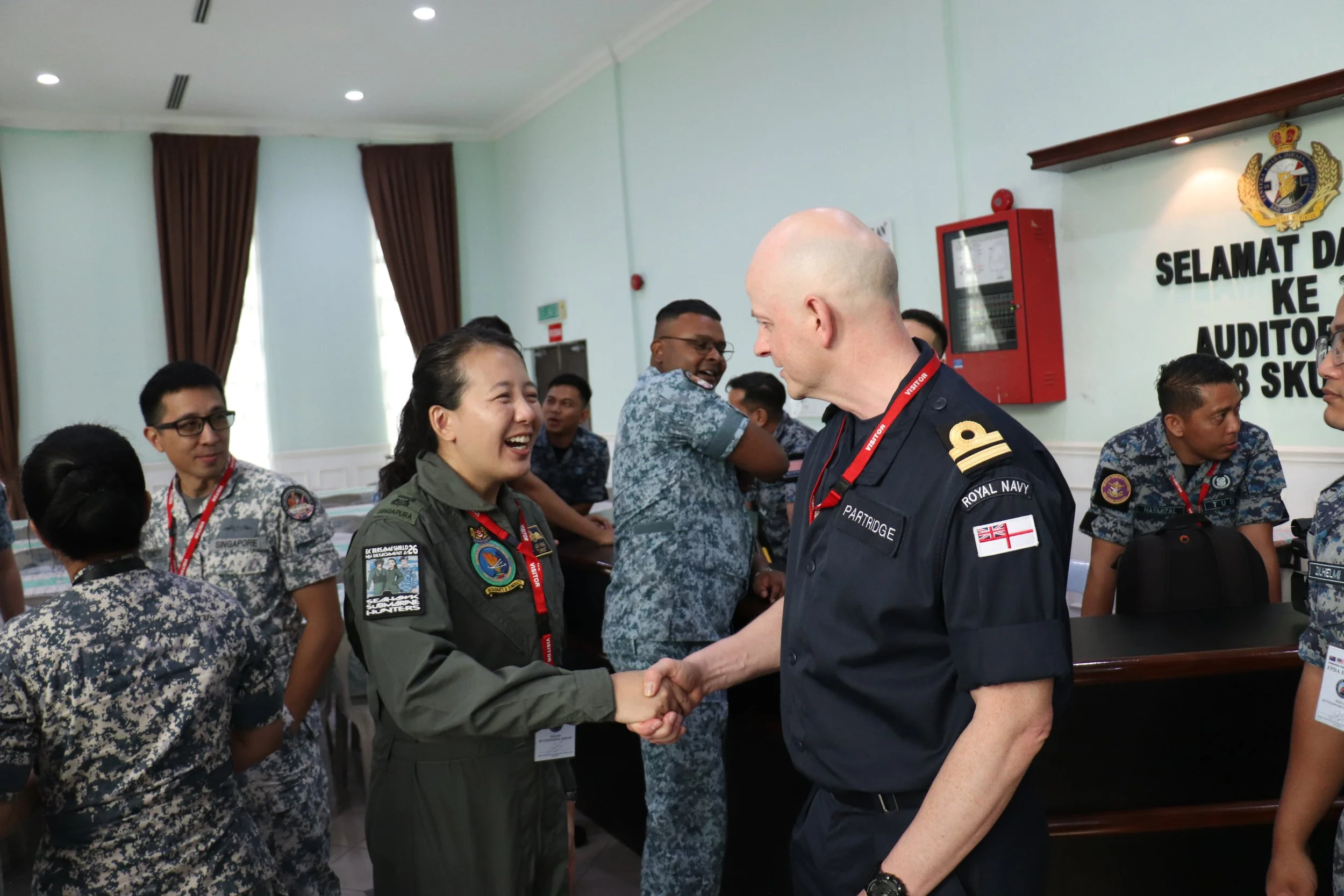 Participants from XBS 26 engaged in greetings exchange
