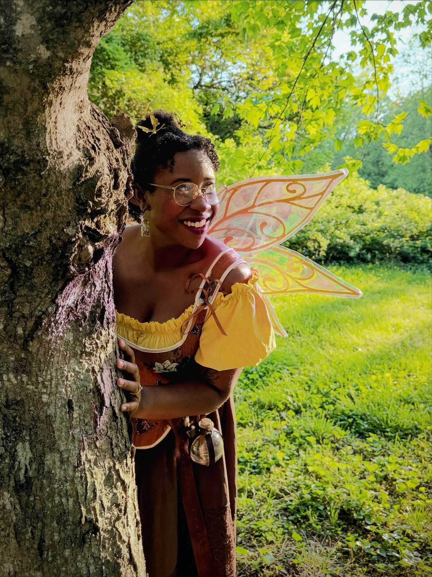 Sunlight peeks through the clouds, and the fairies can't get enough! ☀️ 

Find Ray and other fine fae folk at The Lightbringer Masquerade Ball on March 21st at @faenectar 🎭 Tickets at the link in our bio! ✨

#fairies #masquerade #ashevillenc #thefae