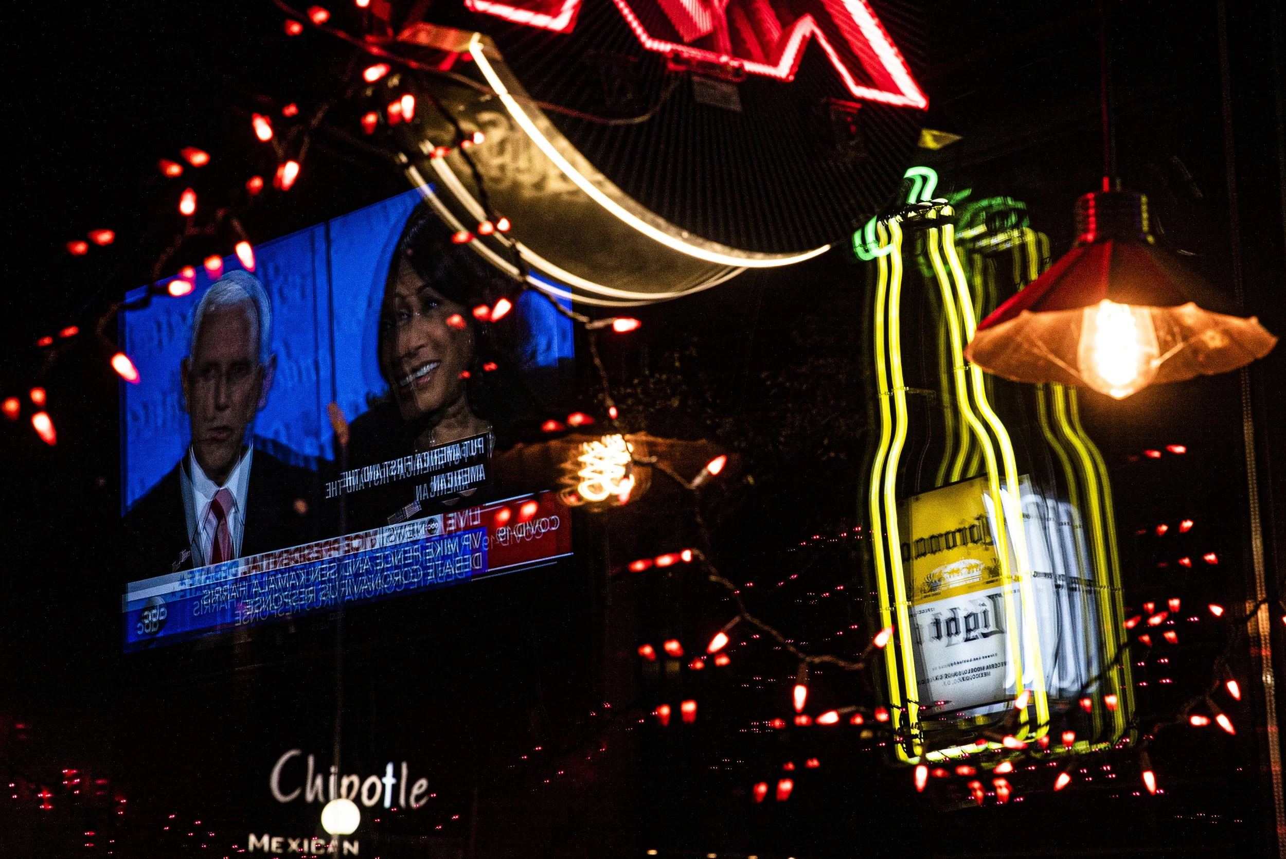  The United States Vice Presidential Debate plays on television inside Cactus 3 in downtown Iowa City on Wednesday, October 7th, 2020. The debate is between U.S. Sen. Kamala Harris, D-California running alongside President-elect Joe Biden and Vice Pr
