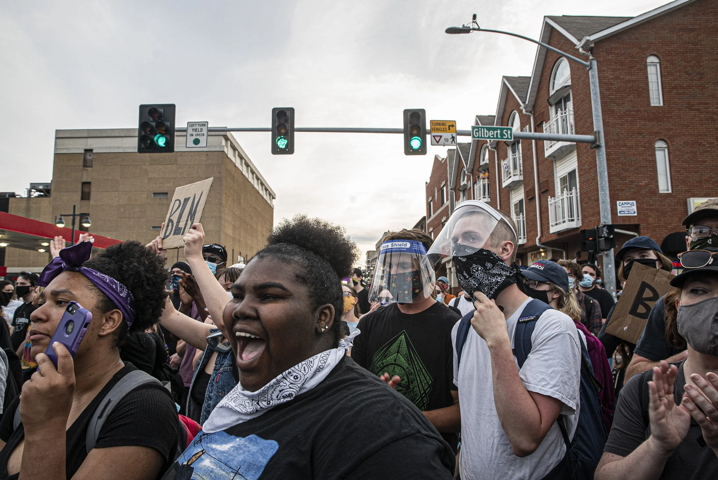  Protesters cheer during an impassioned speech delivered by an Iowa Freedom Rider during a protest march through downtown Iowa City on Monday, June 8th, 2020. For several days, Iowa City has been protesting the murder of George Floyd and systemic rac