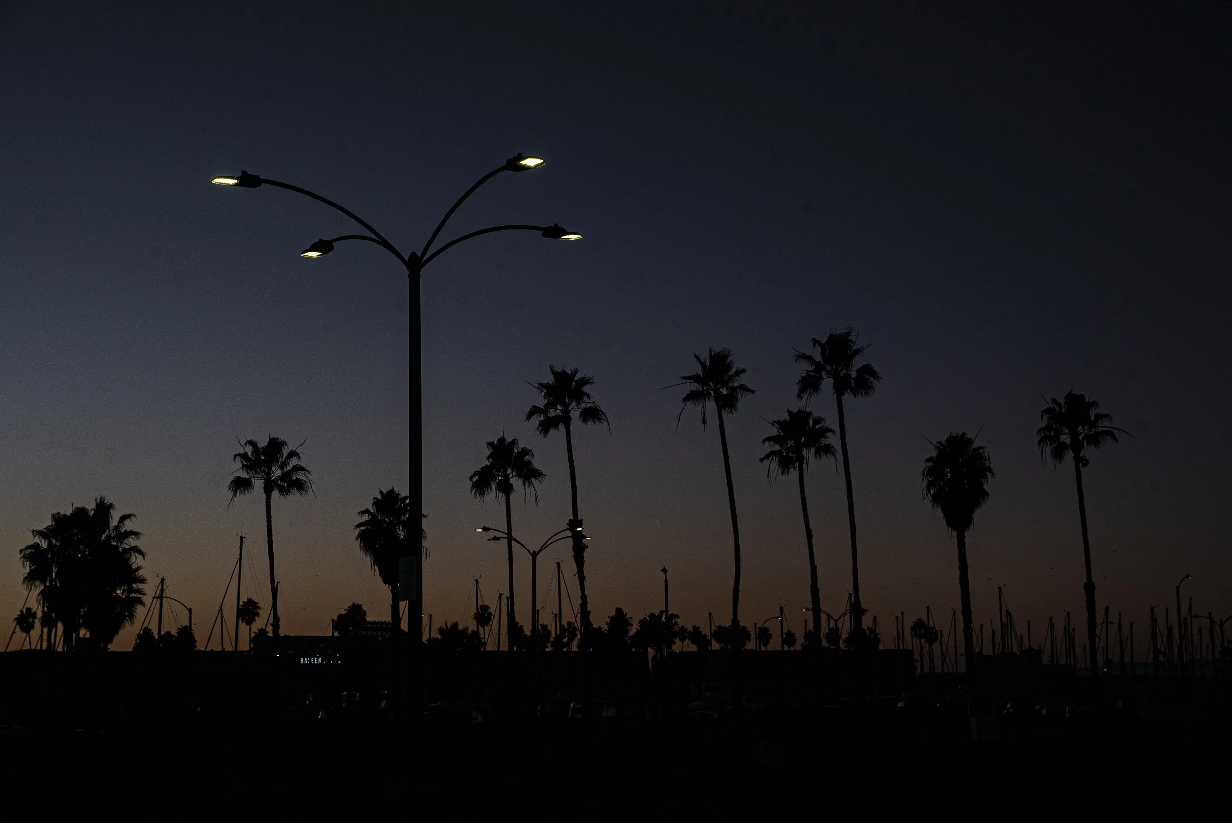  The sun sets just along the boat deck at the Redondo beach Pier on Friday, December 18th, 2020. (Tate Hildyard) 