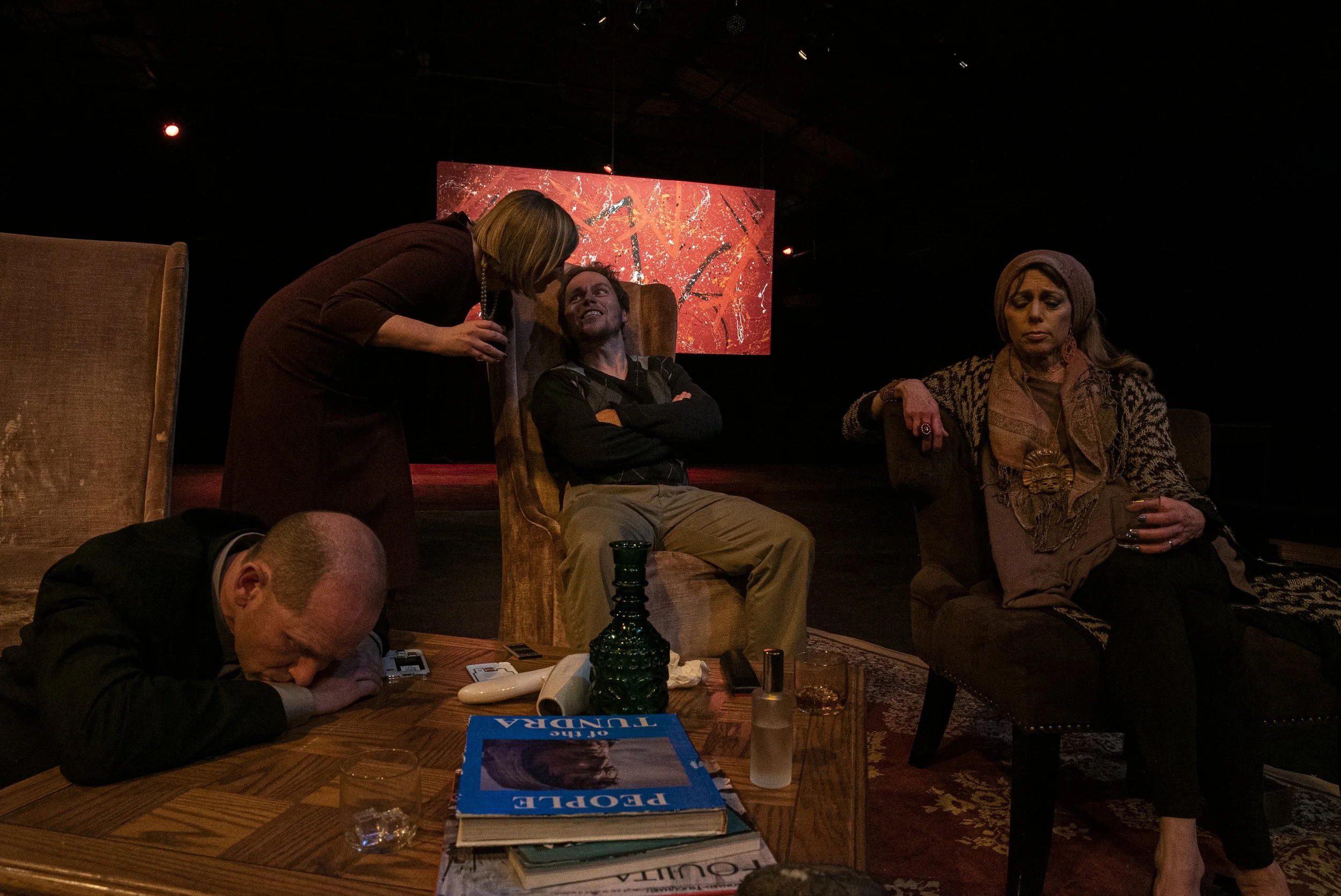  The cast of God of Carnage pretend to be heavily inebriated at the Iowa City Community Theater on Thursday, January 23rd, 2020. God of Carnage follows a smug pair of couples discussing a fight with their children, but the night gradually descends in