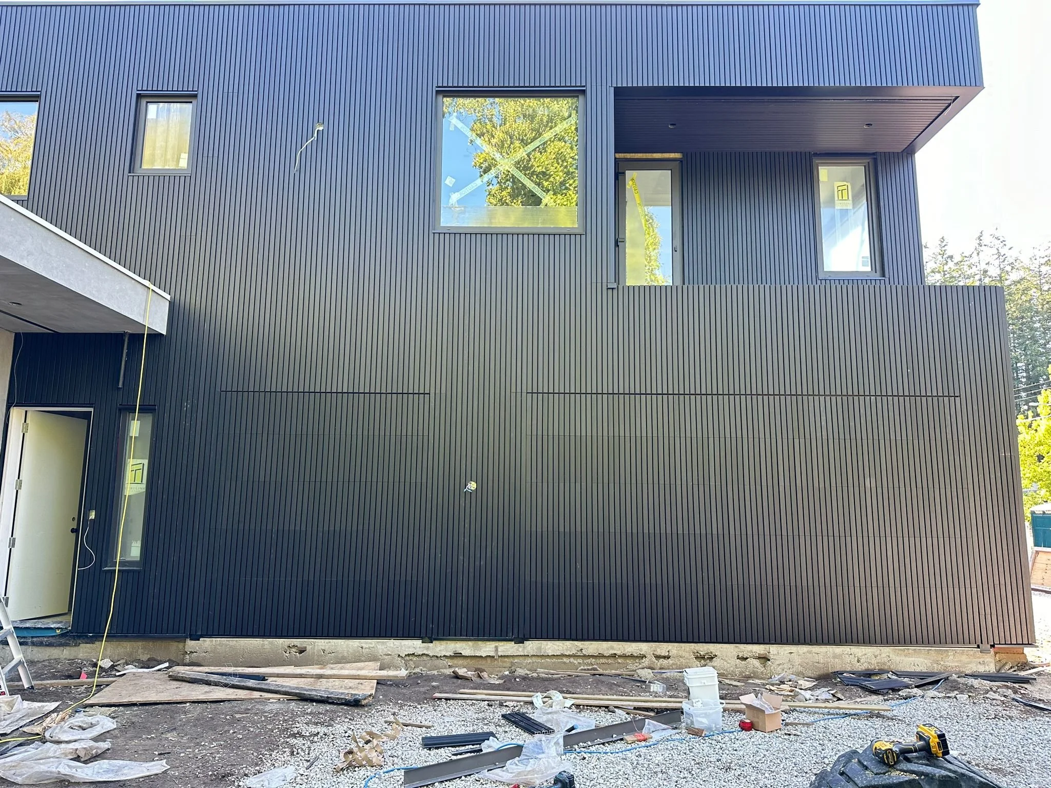 Hidden Garage  with new tech siding