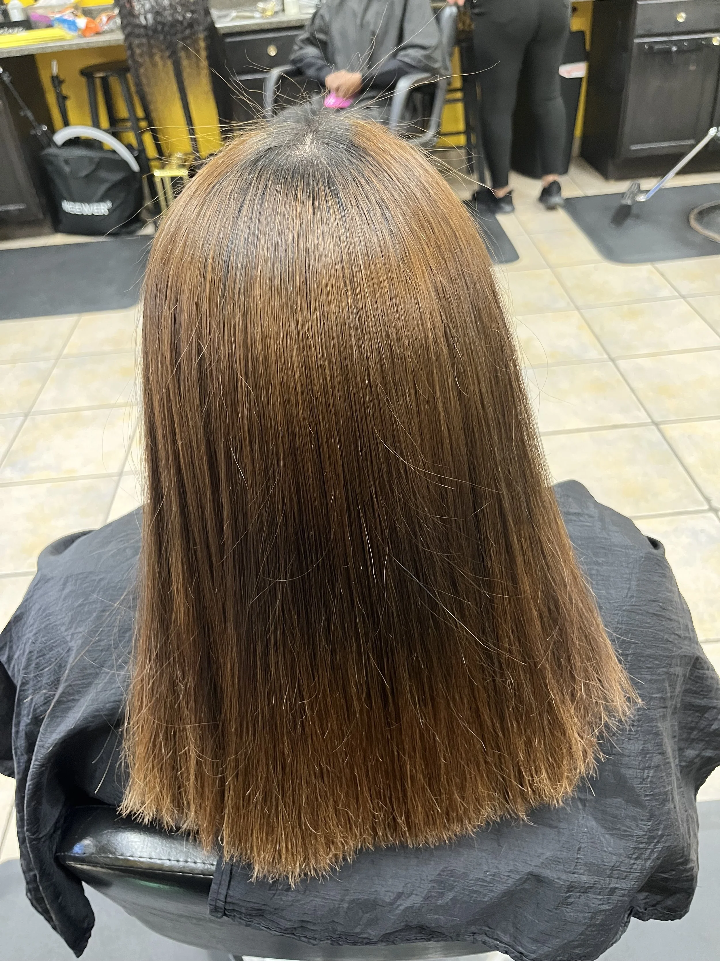 Geometric drawing of an outline square with sections divided by vertical, horizontal, and half circle lines.