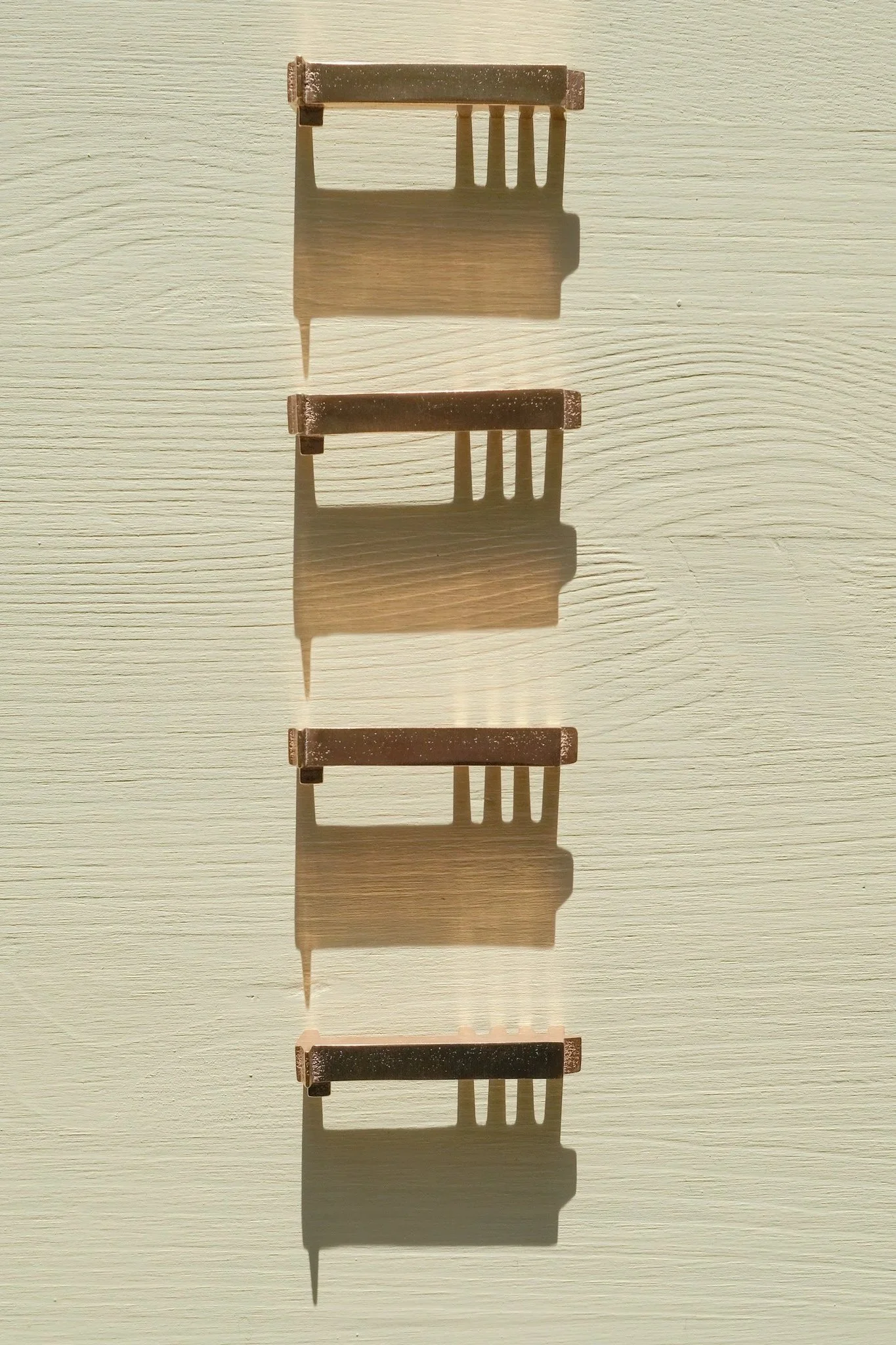 Giraffes, in brass. Smörgiraffer i mässing.