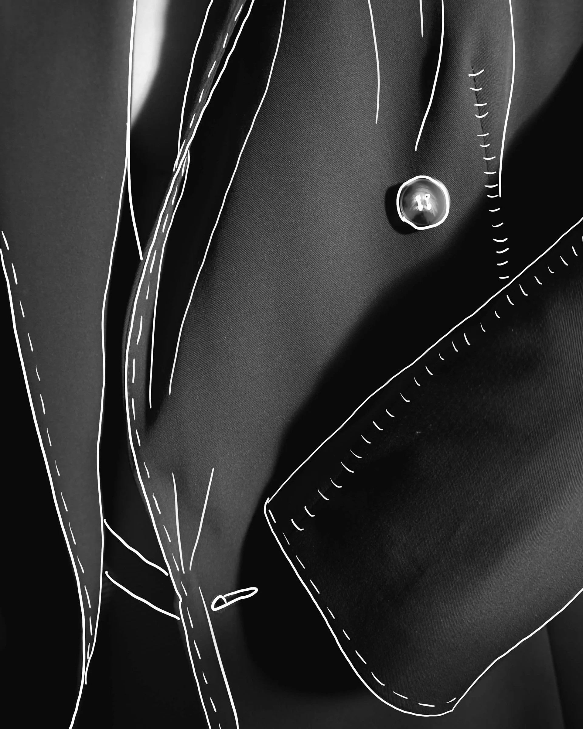 Close-up of a black leather jacket with white outline illustrations highlighting the seams and pocket, featuring a metallic button on the chest.