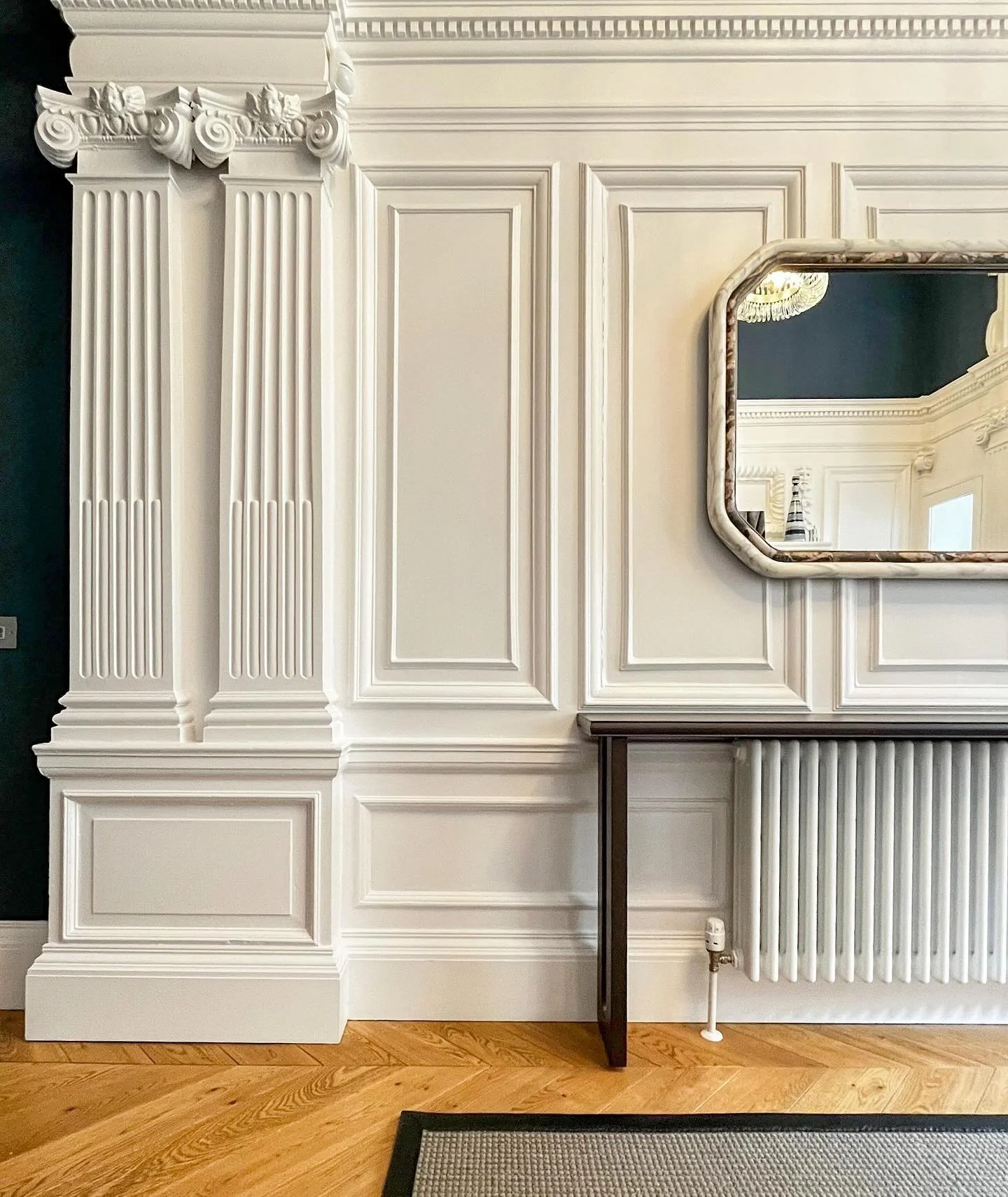 A made to measure console table, built to fit perfectly between the radiator and wall panelling with minimal tolerance to work with. Finished with a classic edge bead detail that ties in beautifully with the home&rsquo;s original Victorian charm. A s