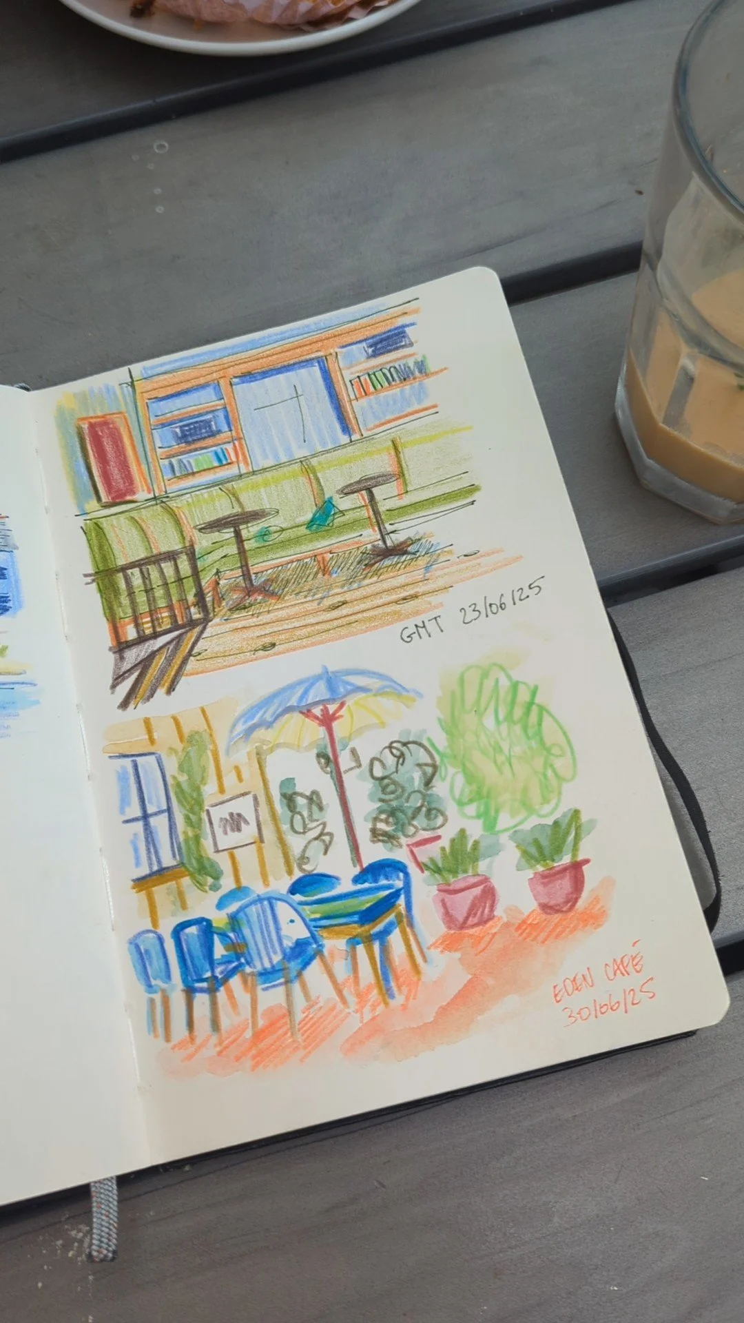 Sketch of a cafe scene with outdoor seating, colorful chairs, potted plants, and an umbrella.